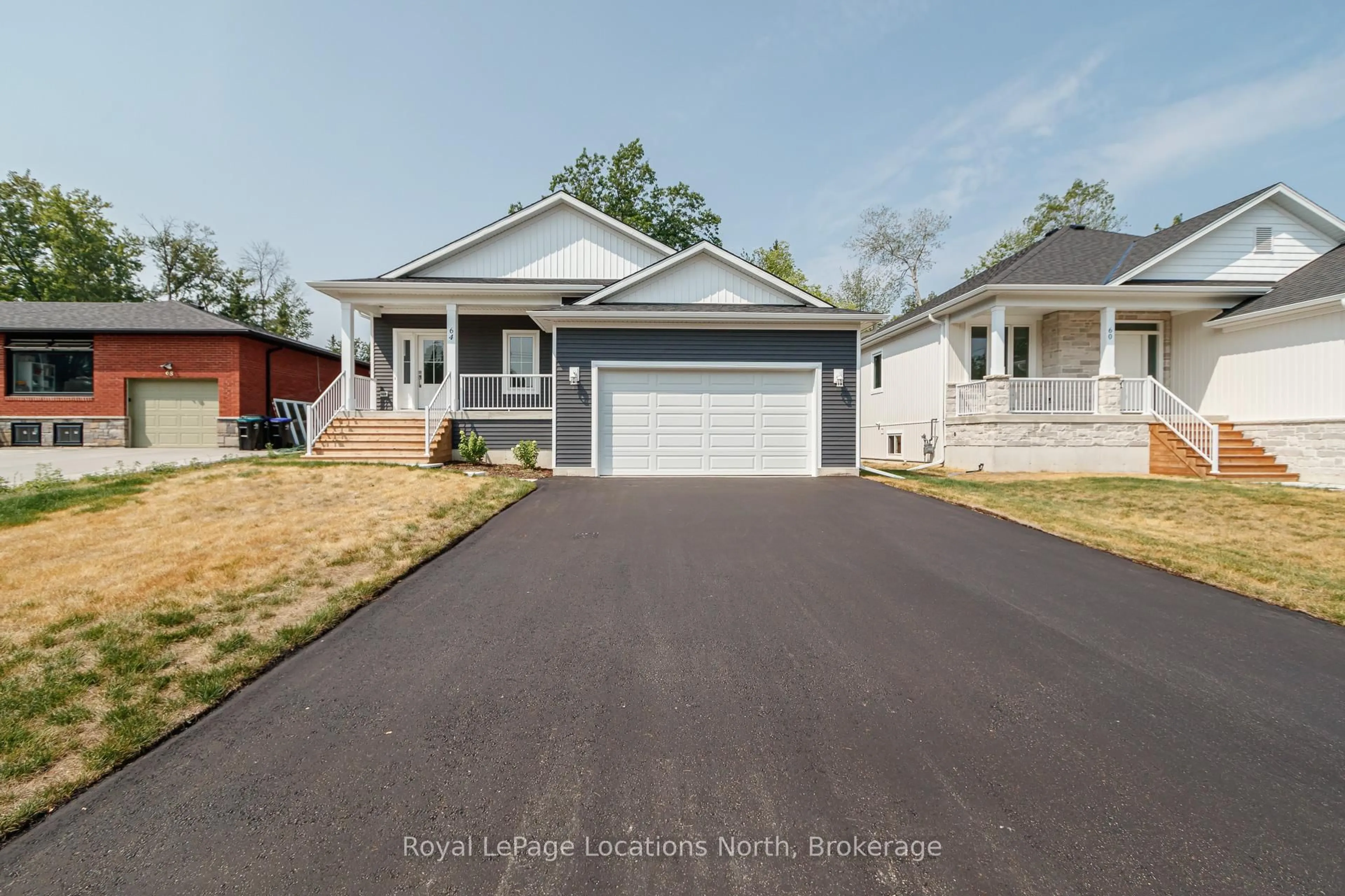 Home with vinyl exterior material, street for 64 52nd St, Wasaga Beach Ontario L9Z 1W8