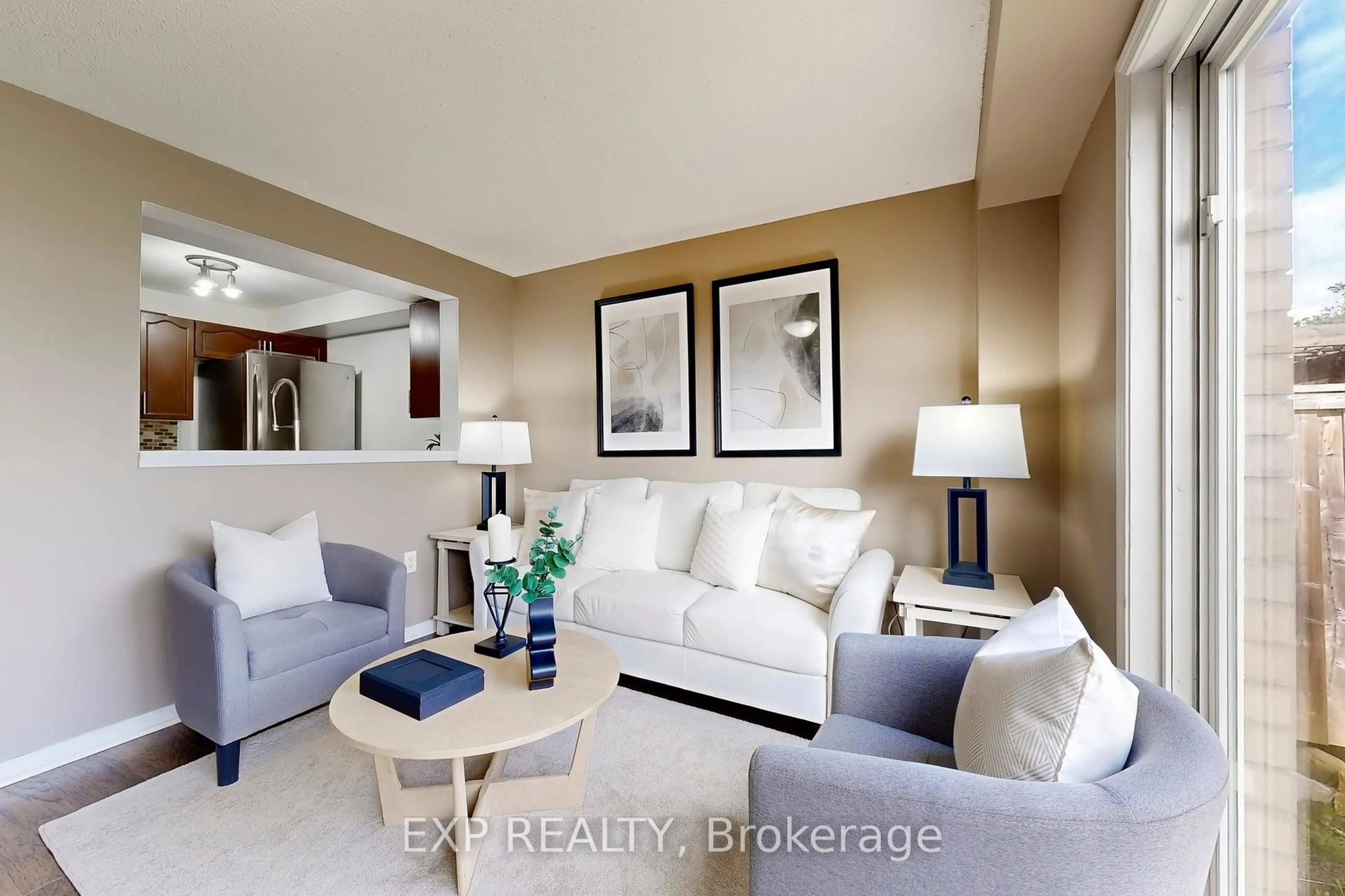Living room with furniture, ceramic/tile floor for 69 Goodwin Dr, Barrie Ontario L4N 5Z8