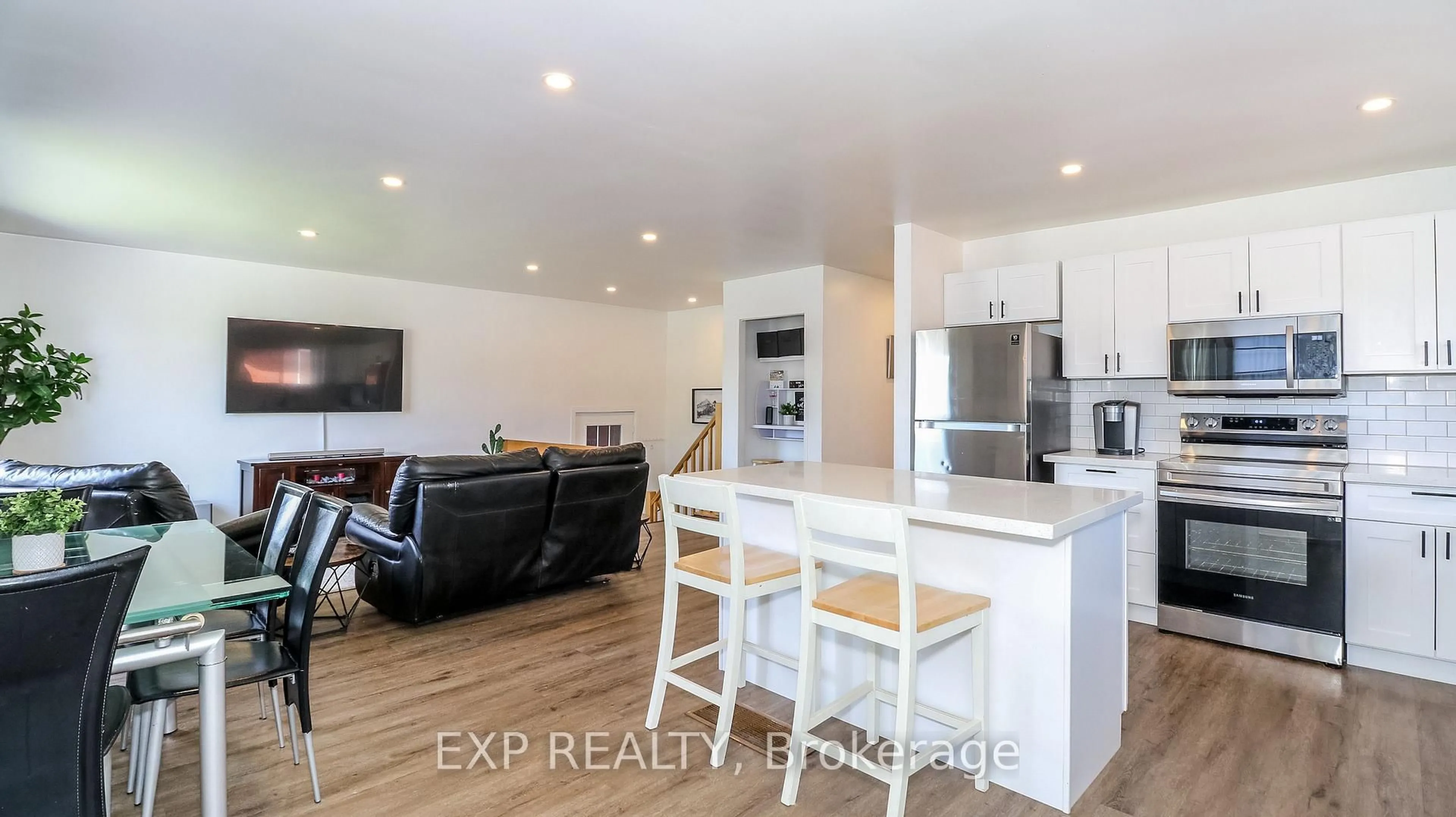 Open concept kitchen, wood/laminate floor for 5 Bourgeois Beach Rd, Tay Ontario L0K 2A0