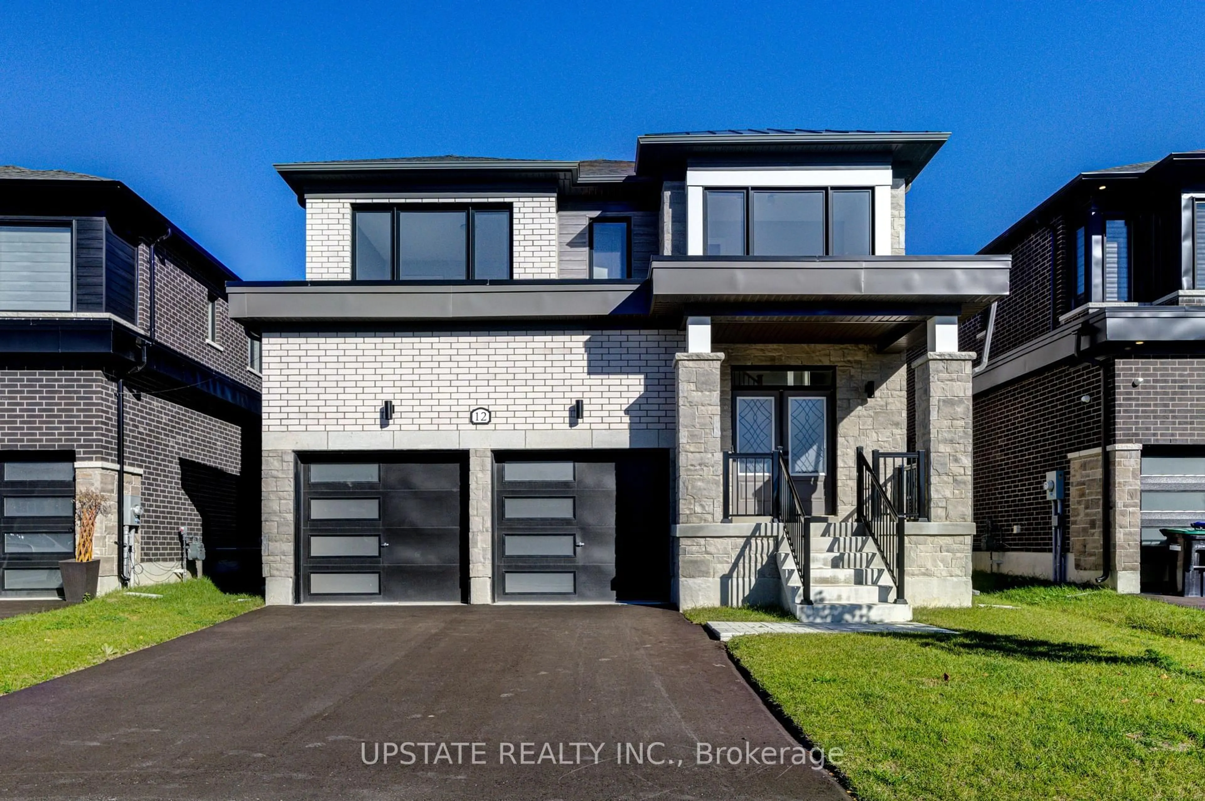 Home with brick exterior material, street for 12 Nicort Rd, Wasaga Beach Ontario L9Z 0N4