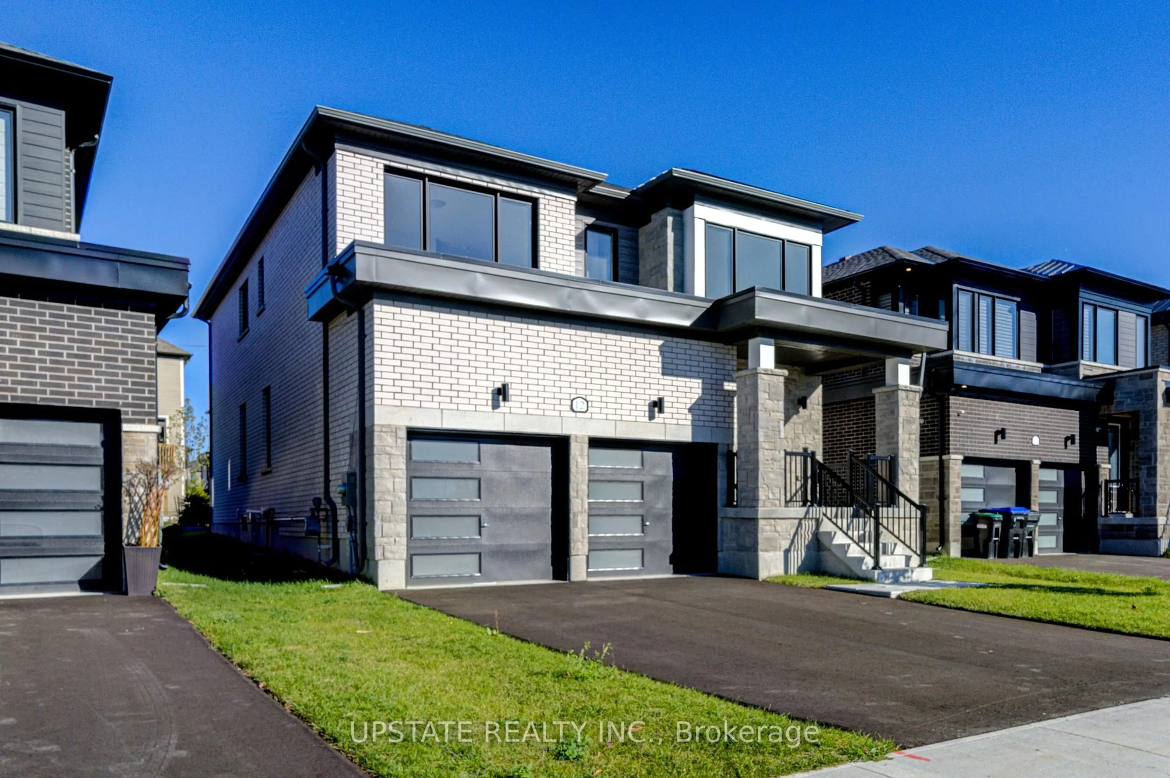 Home with brick exterior material, street for 12 Nicort Rd, Wasaga Beach Ontario L9Z 0N4