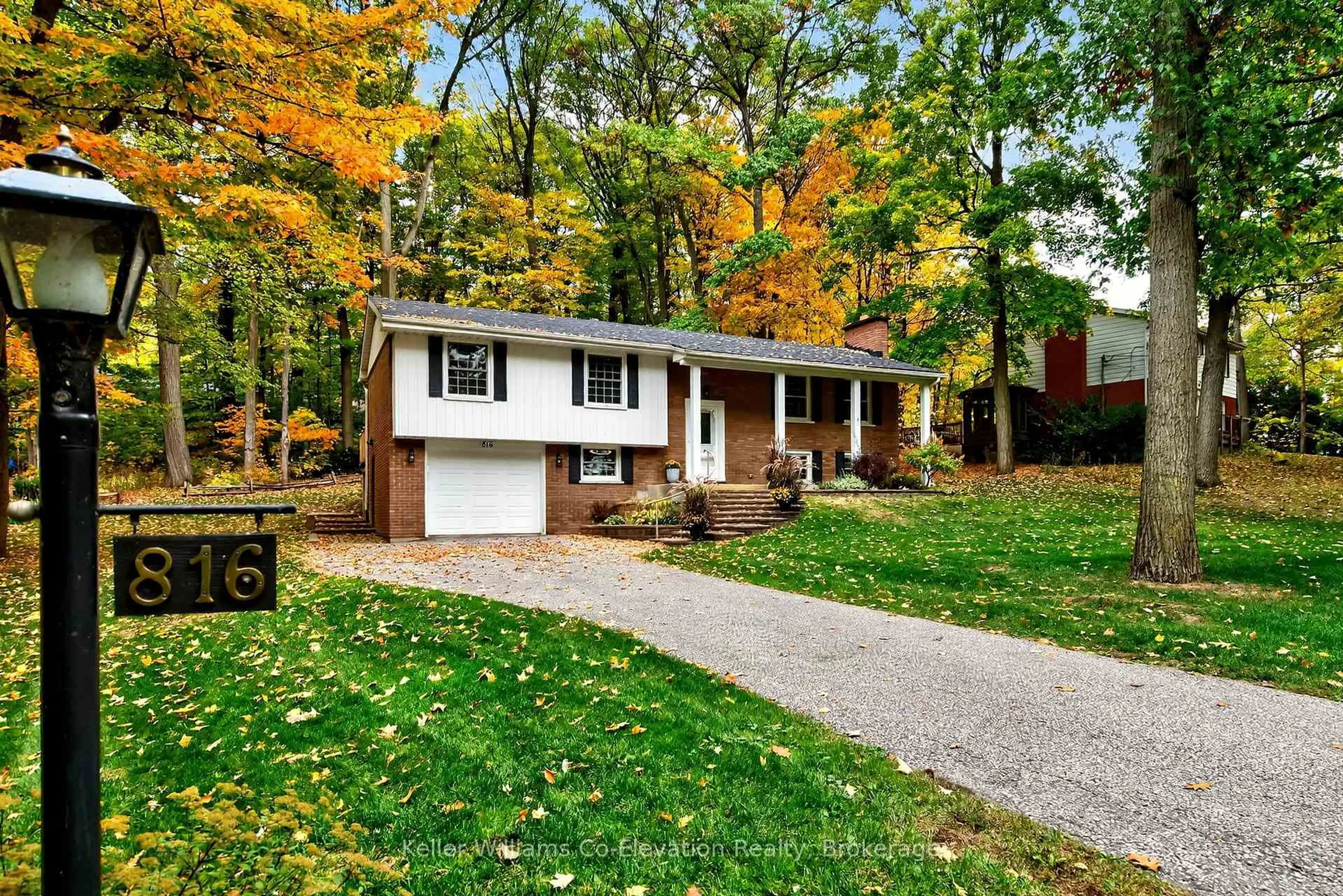 Home with brick exterior material, street for 816 Portage Park Lane, Midland Ontario L4R 5G3