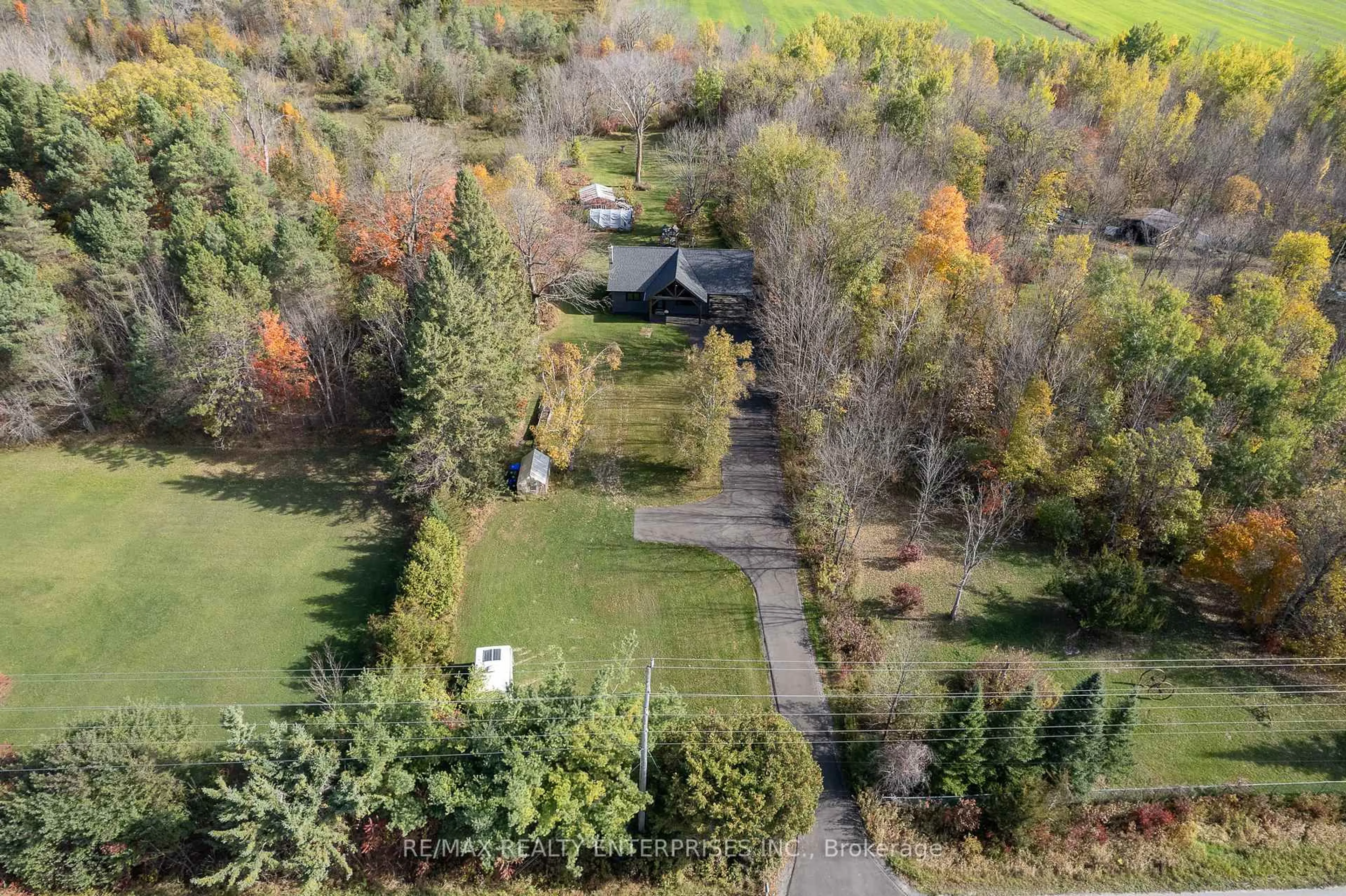 A pic from outside/outdoor area/front of a property/back of a property/a pic from drone, forest/trees view for 2035 Quarry Rd, Severn Ontario L0K 1E0