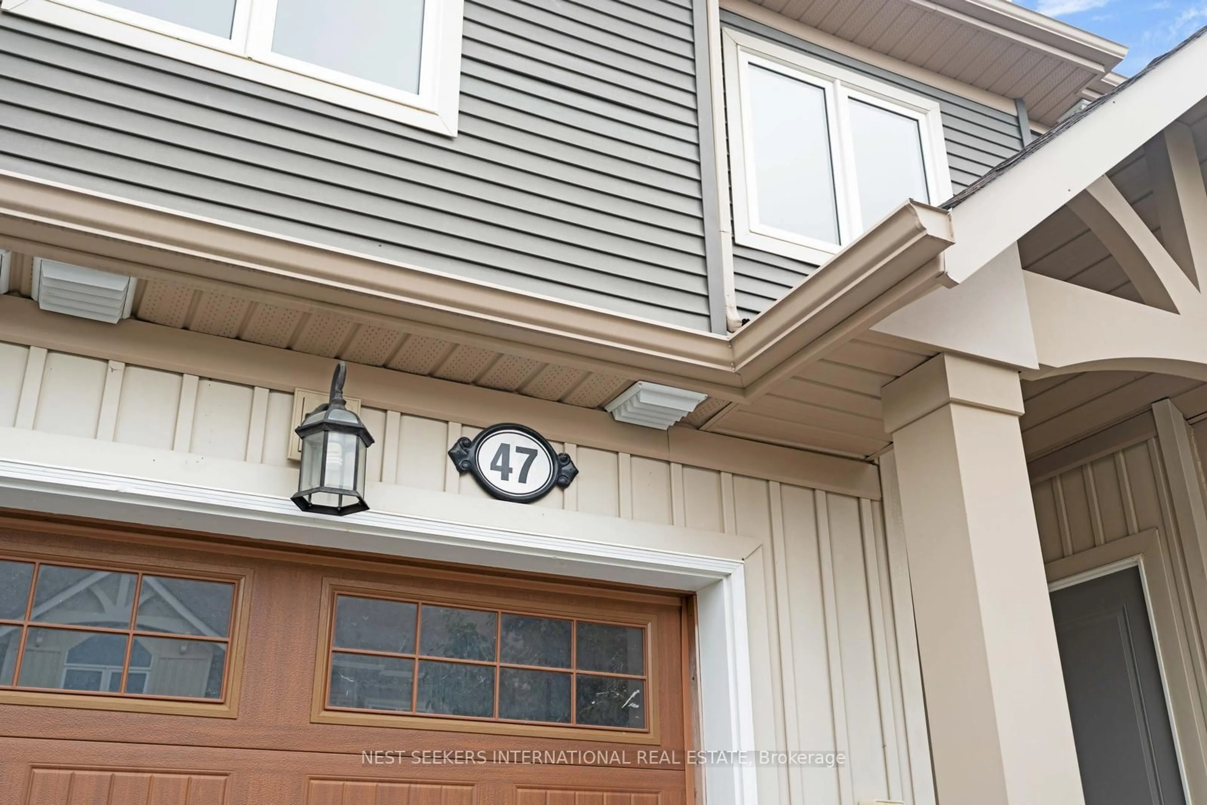 Home with vinyl exterior material, street for 47 Lett Ave, Collingwood Ontario L9Y 0Z5