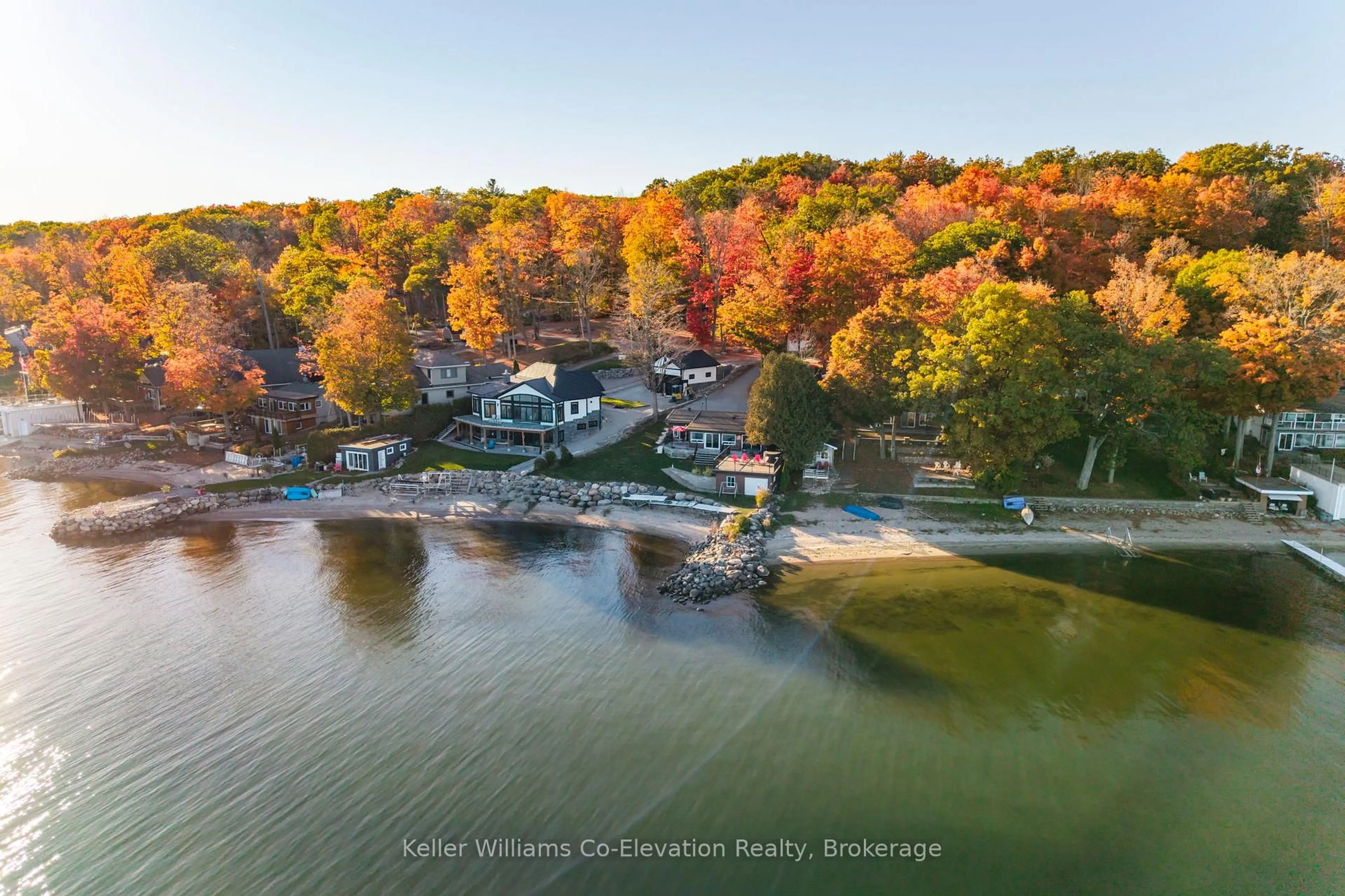 A pic from outside/outdoor area/front of a property/back of a property/a pic from drone, water/lake/river/ocean view for 417 Pheasant Lane, Midland Ontario L4R 5H3