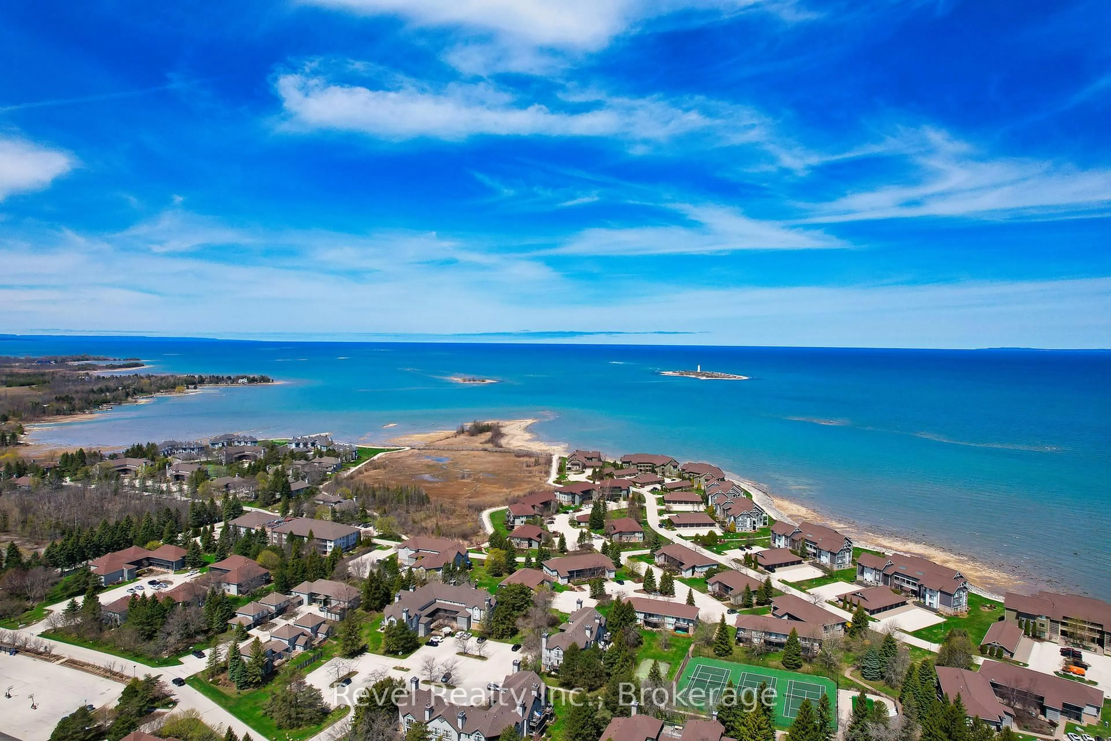 A pic from outside/outdoor area/front of a property/back of a property/a pic from drone, water/lake/river/ocean view for 24 Ramblings Way #305, Collingwood Ontario L9Y 5S7