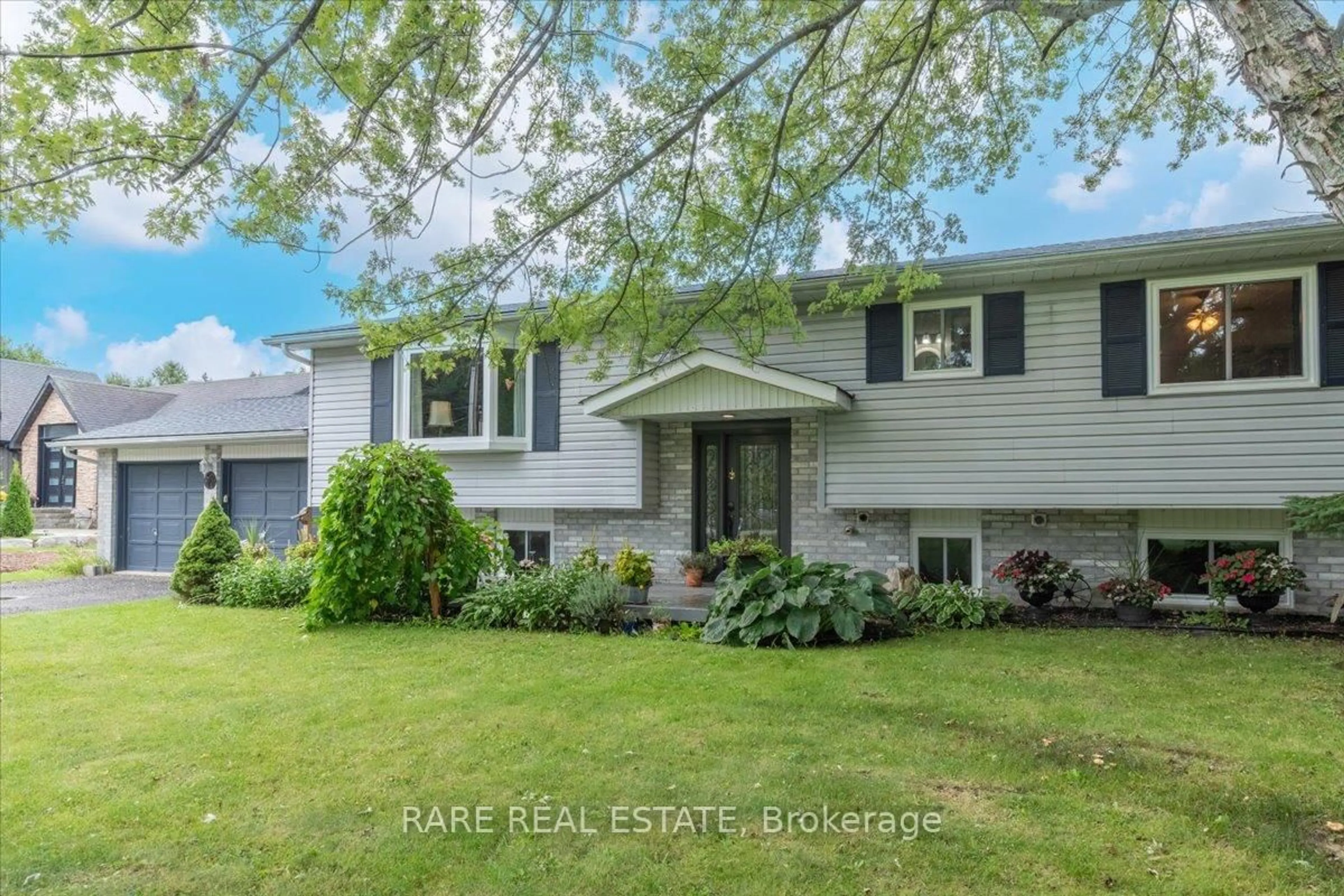 Home with vinyl exterior material, unknown for 66 Scarlett Line, Springwater Ontario L0L 1V0