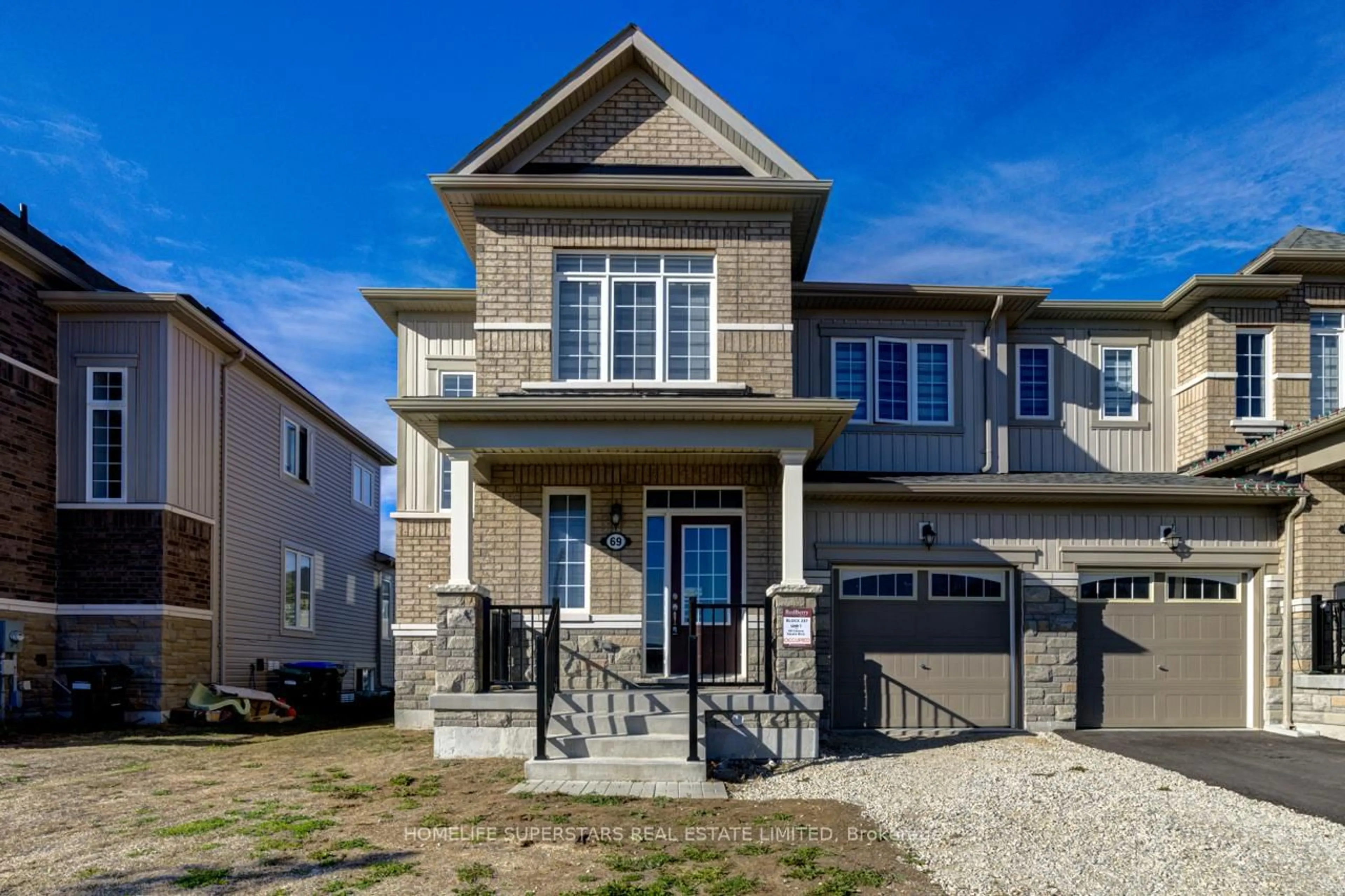 Home with brick exterior material, street for 69 Central Square Blvd, Wasaga Beach Ontario L9Z 0L9