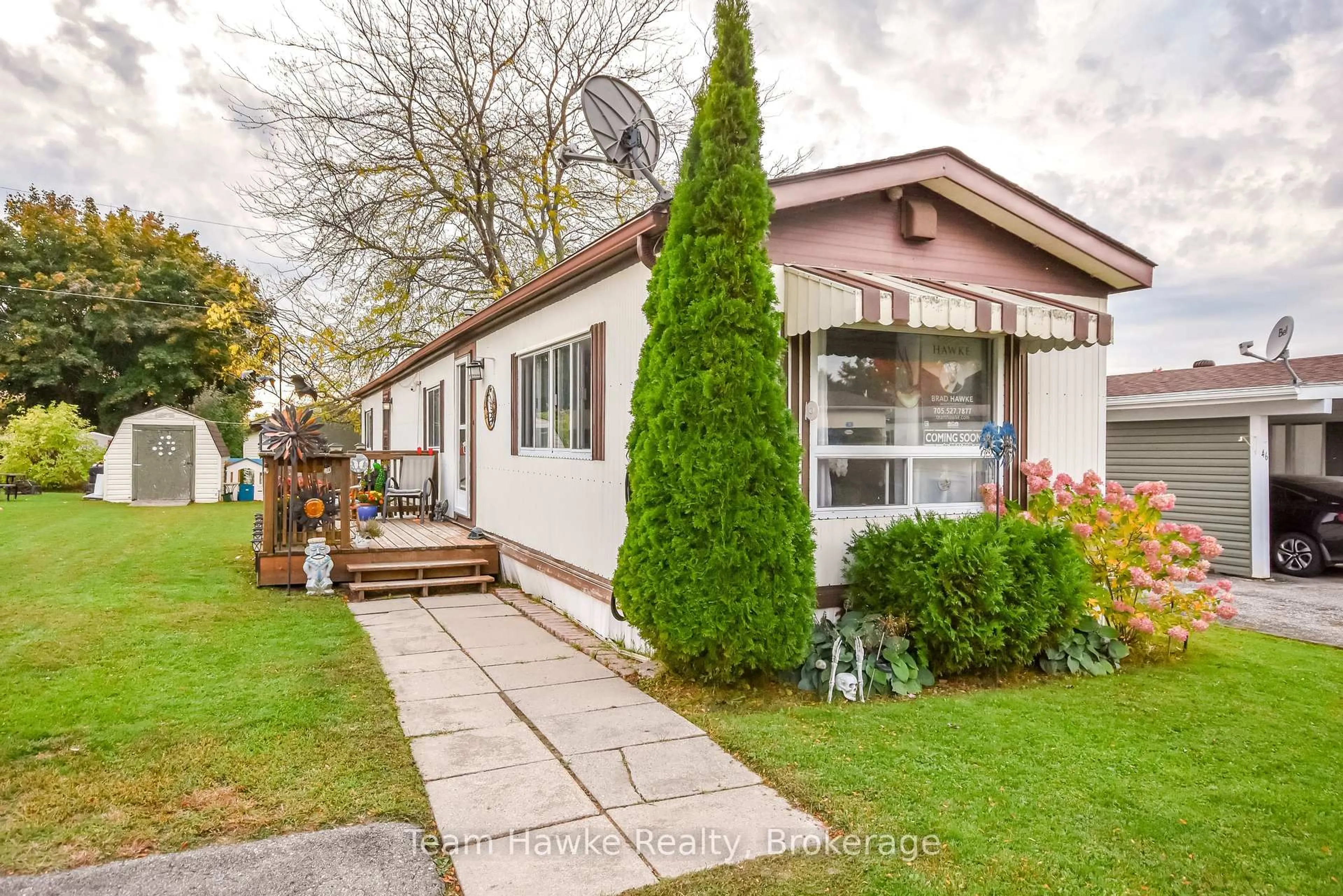 Home with vinyl exterior material, street for 48 Northland Dr, Midland Ontario L4R 5B5