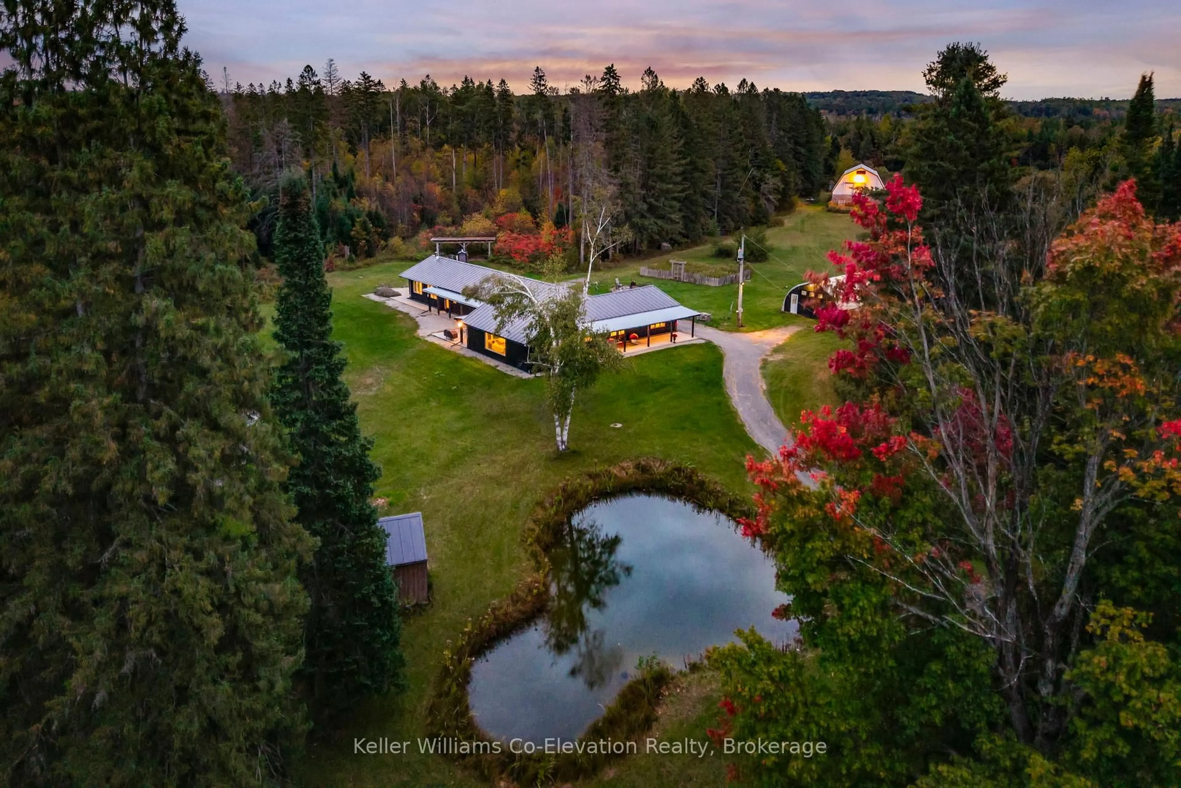 A pic from outside/outdoor area/front of a property/back of a property/a pic from drone, water/lake/river/ocean view for 1076 Beaver Lane, Springwater Ontario L9X 0M1