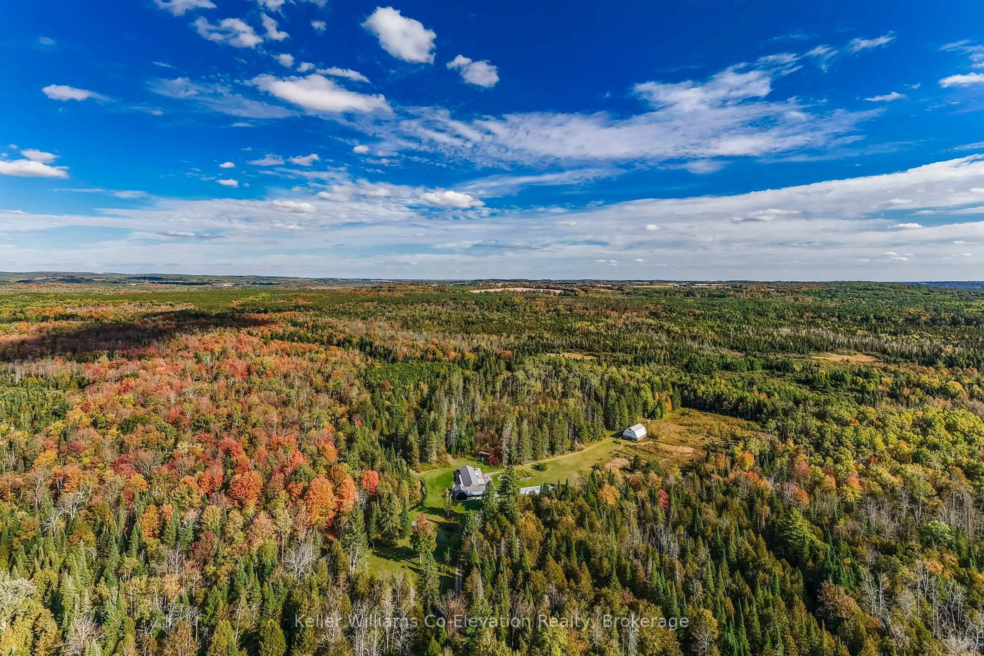 A pic from outside/outdoor area/front of a property/back of a property/a pic from drone, forest/trees view for 1076 Beaver Lane, Springwater Ontario L9X 0M1