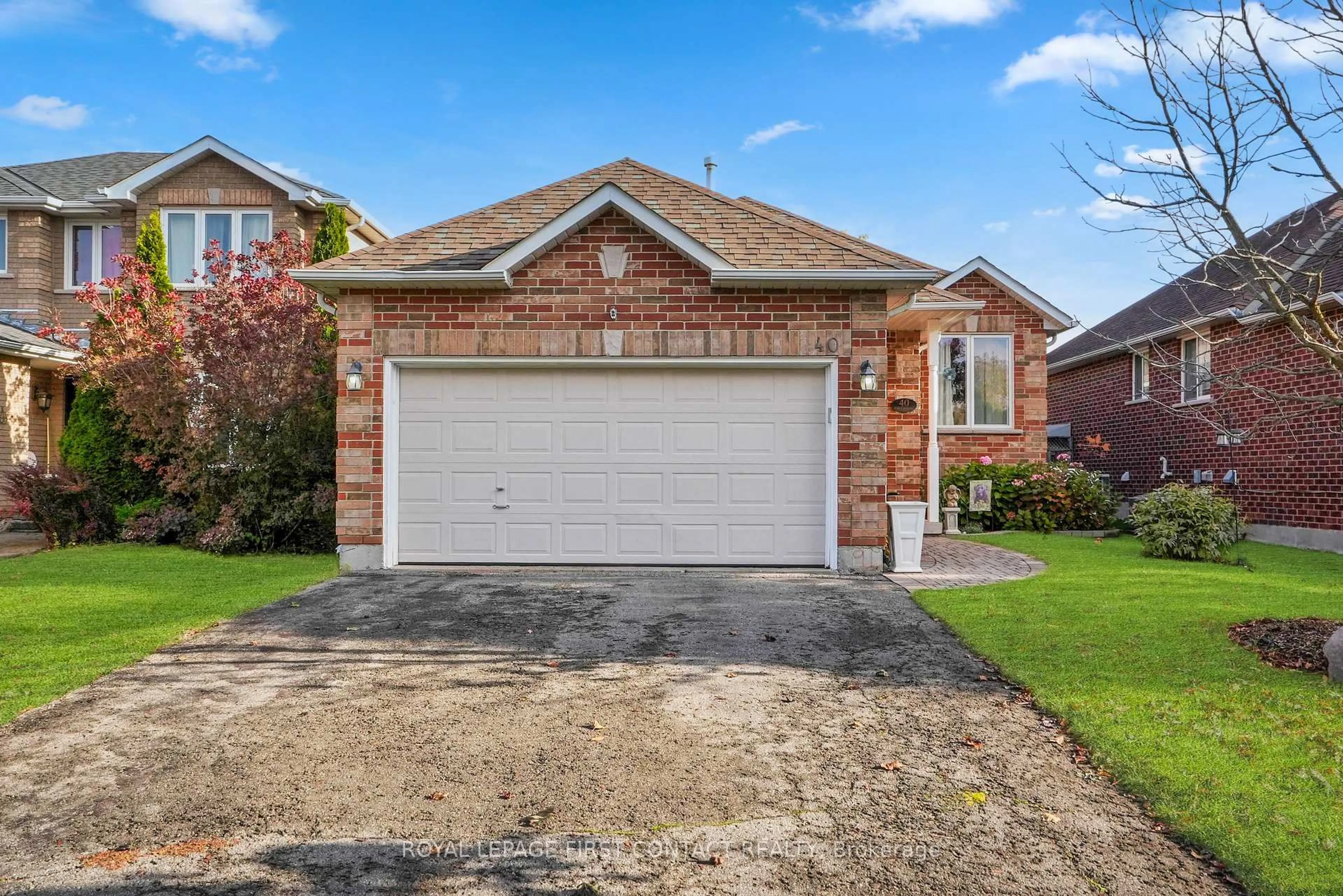Home with brick exterior material, street for 40 Felt Cres, Barrie Ontario L4N 8V1