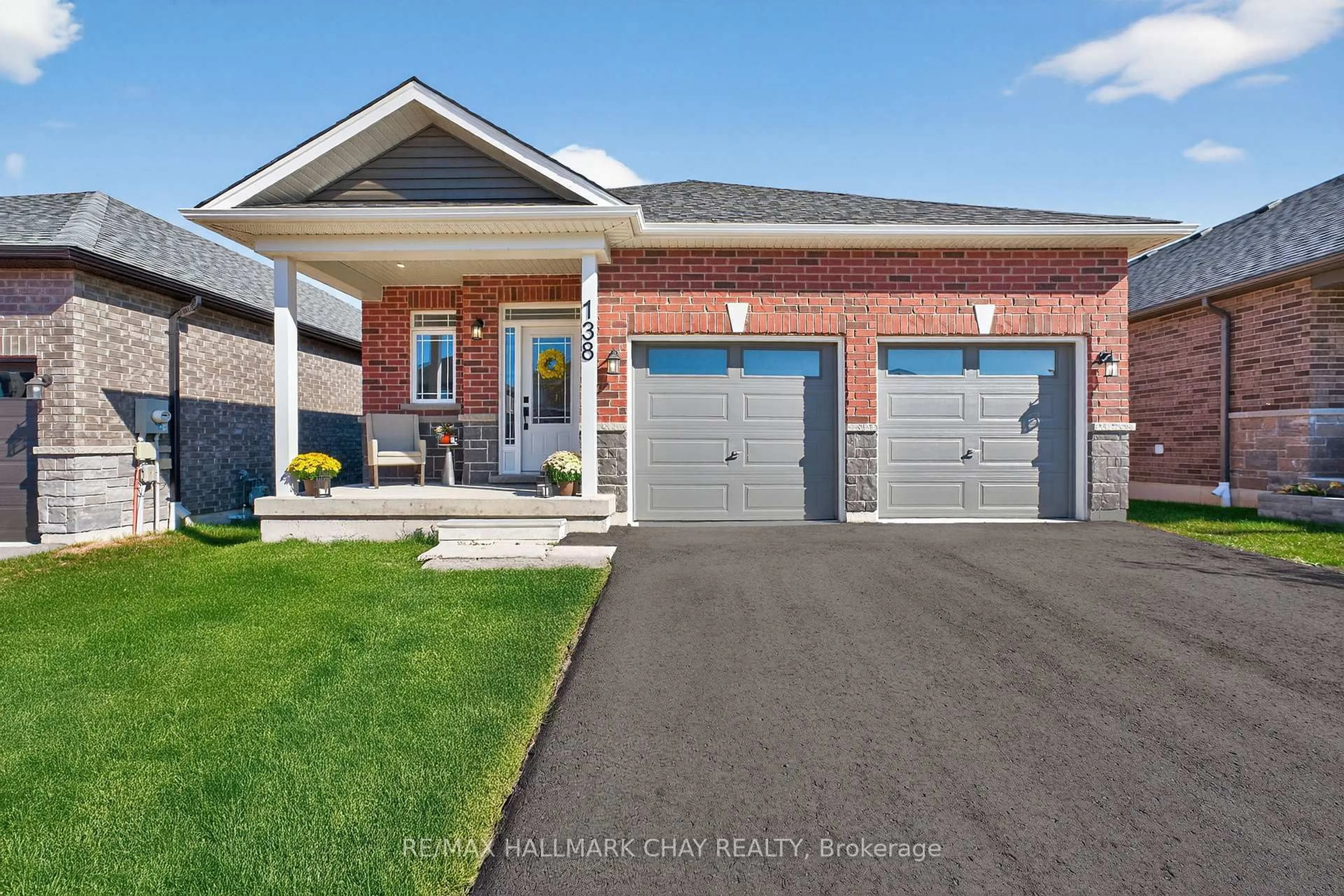 Home with brick exterior material, street for 138 Ritchie Cres, Springwater Ontario L0L 1P0