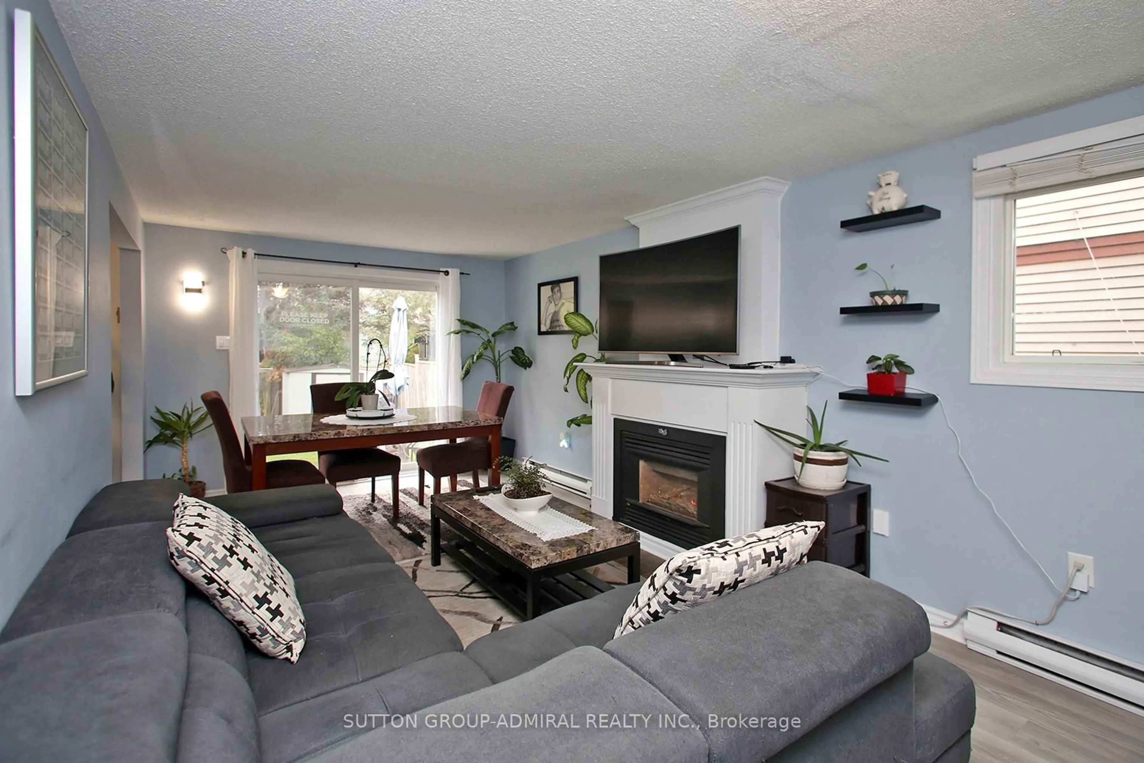 Living room with furniture, unknown for 39 Corbett Dr, Barrie Ontario L4M 5S9
