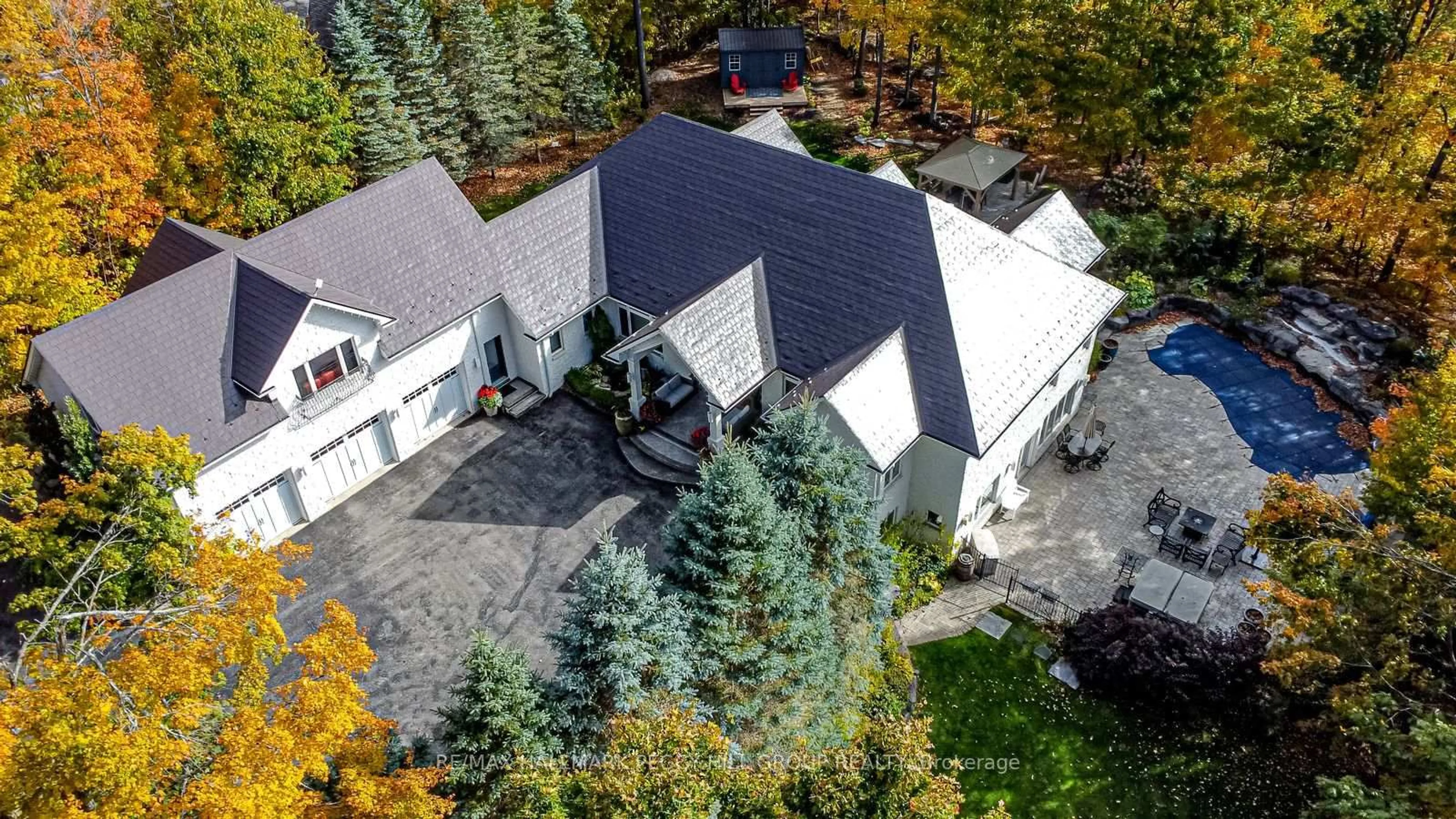 A pic from outside/outdoor area/front of a property/back of a property/a pic from drone, street for 7 Maple Ridge Rd, Oro-Medonte Ontario L0L 2L0