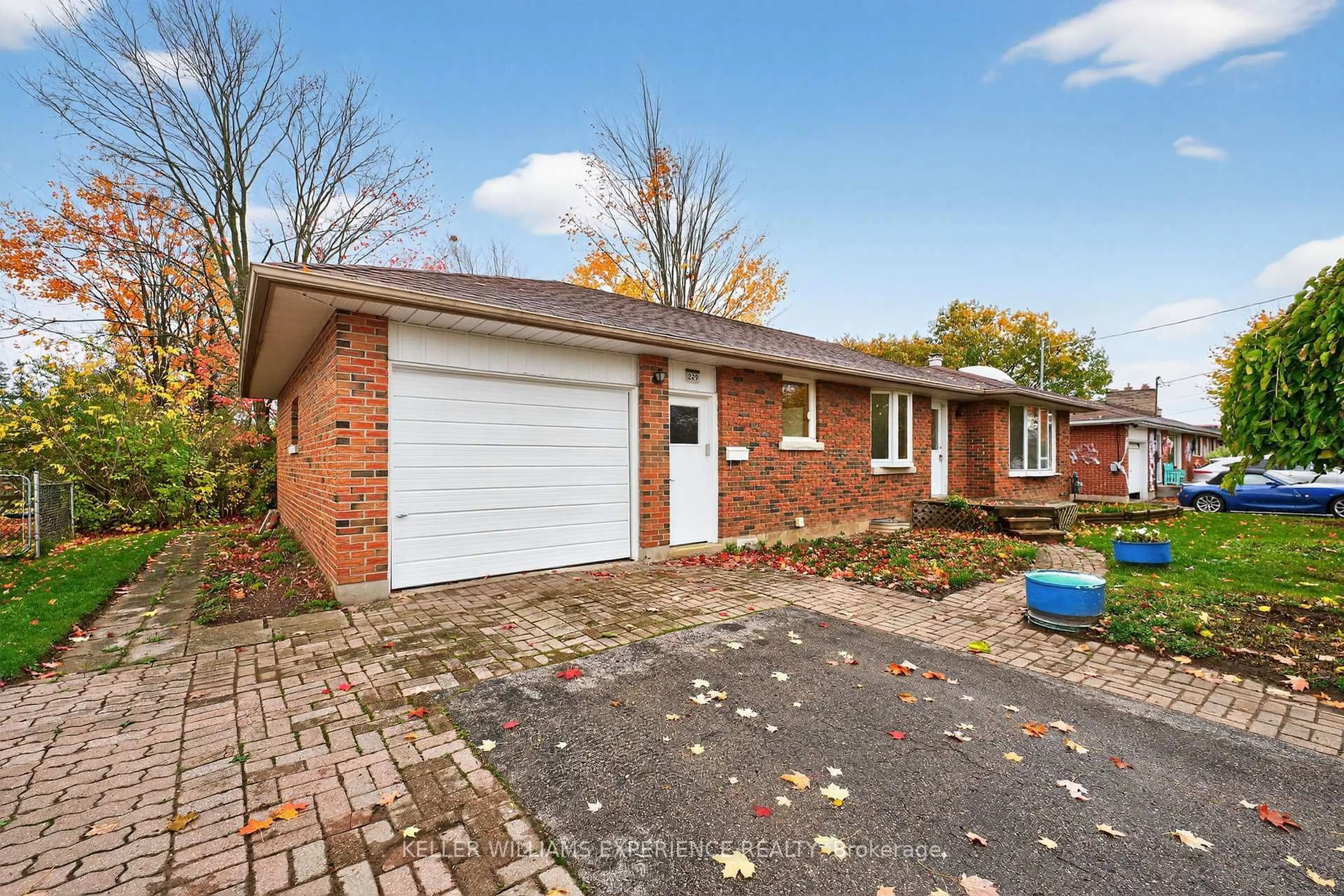 Home with brick exterior material, street for 229 Warnica Rd, Barrie Ontario L4N 3Z2