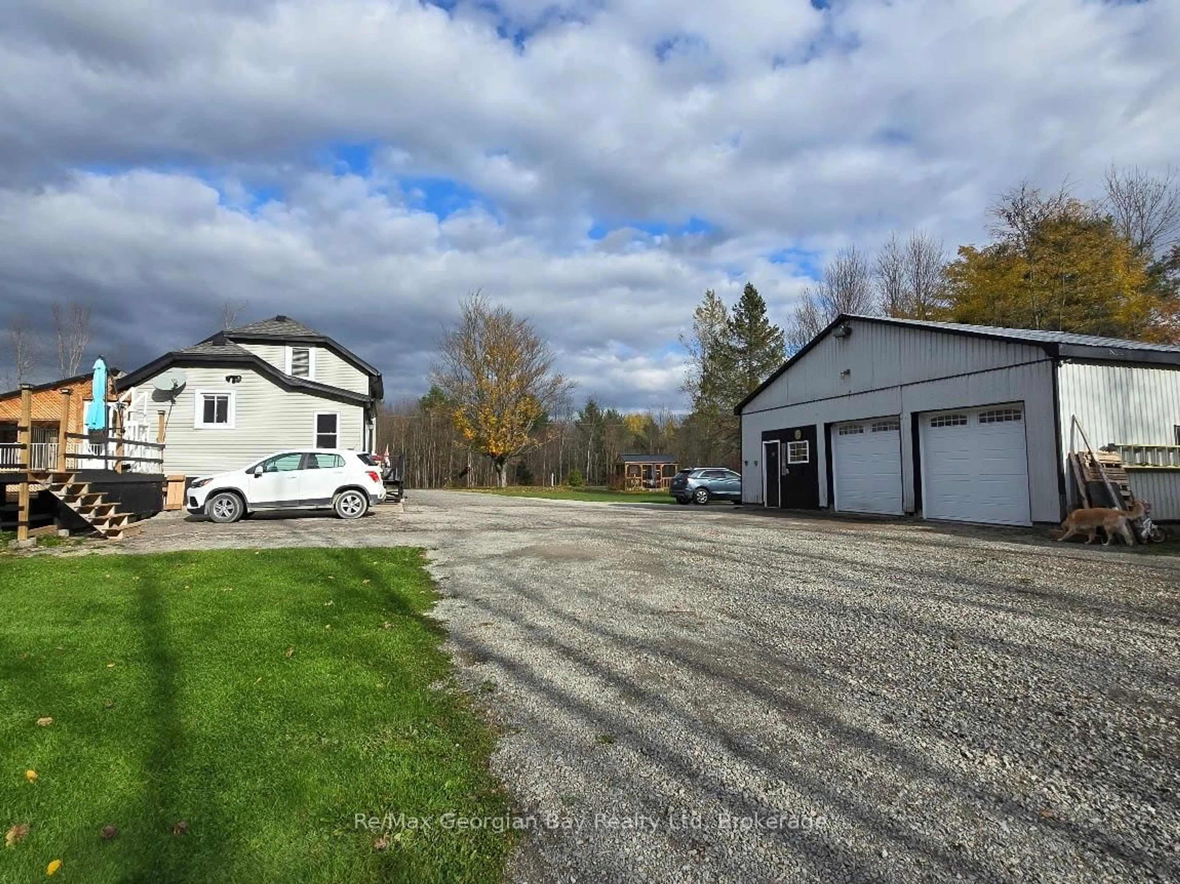 A pic from outside/outdoor area/front of a property/back of a property/a pic from drone, street for 2066 IRISH Line, Severn Ontario L0K 1E0