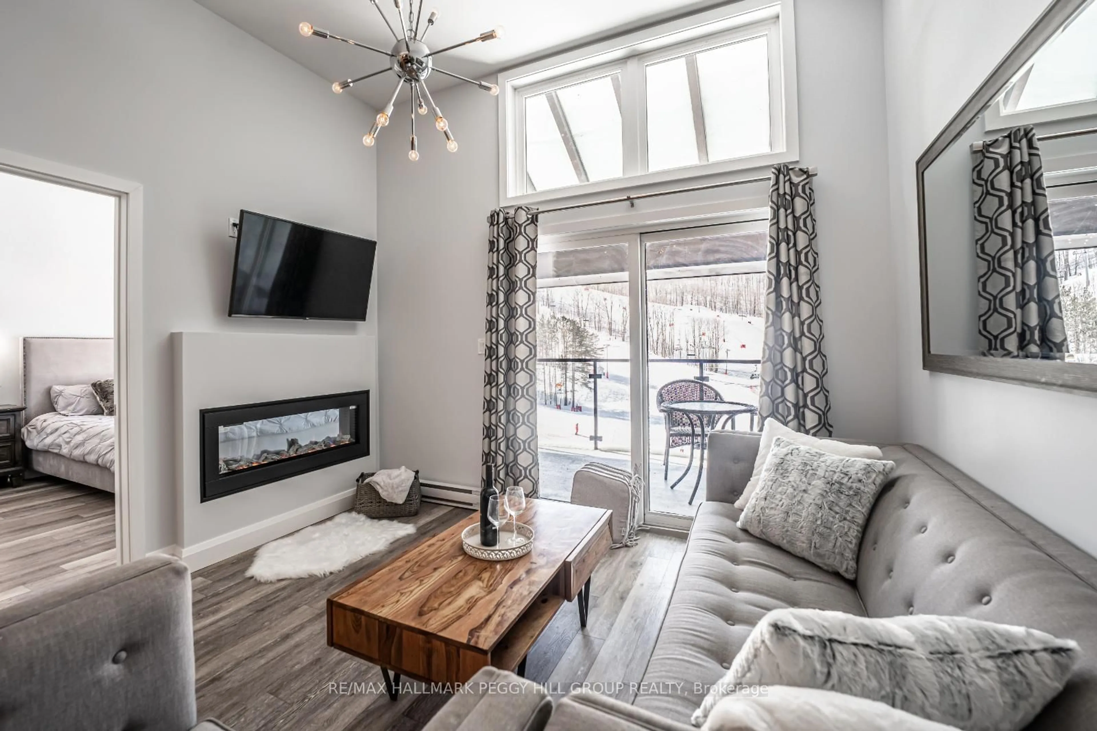 Living room with furniture, unknown for 80 Horseshoe Blvd #503, Oro-Medonte Ontario L4M 4Y8