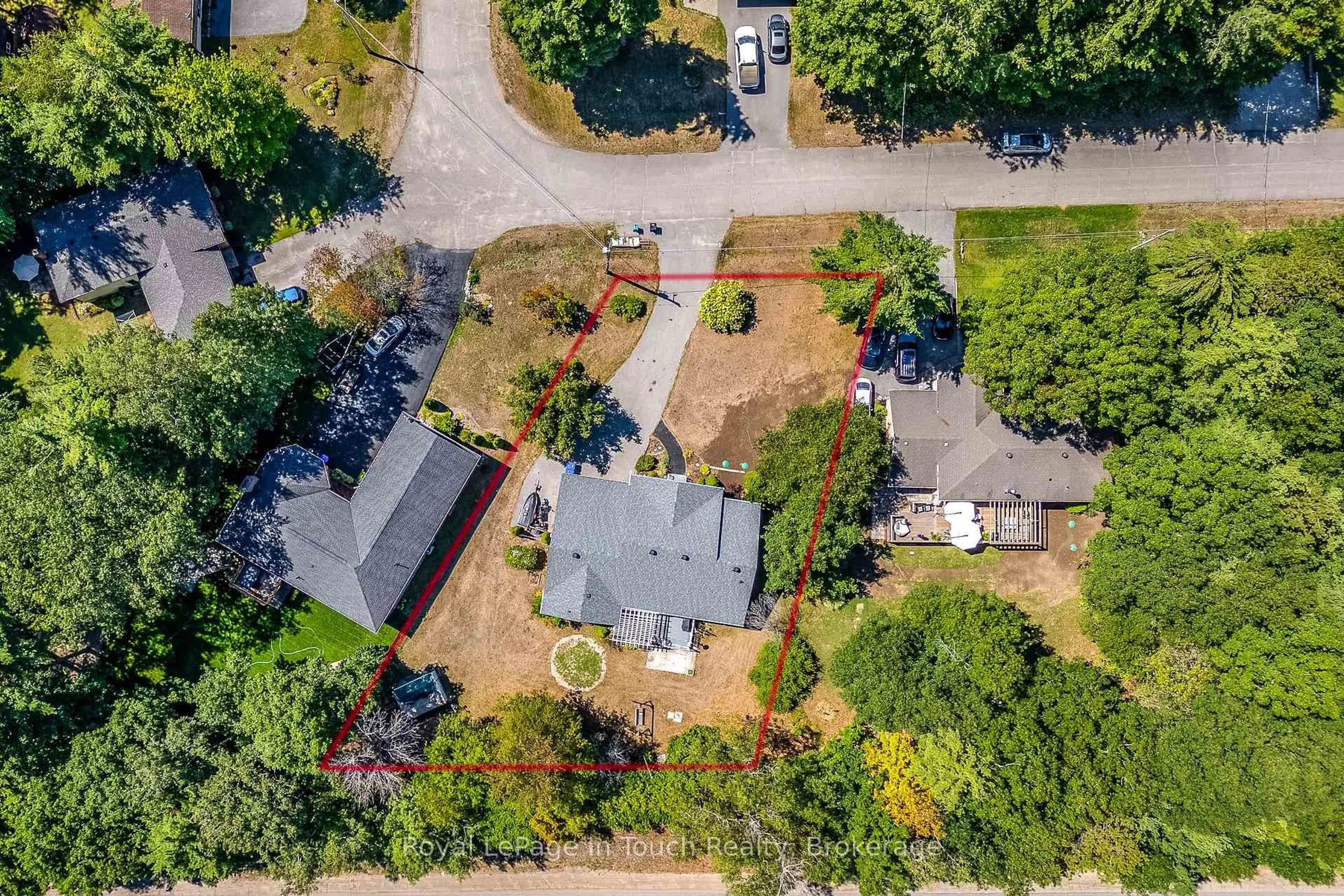 A pic from outside/outdoor area/front of a property/back of a property/a pic from drone, street for 59 Stocco Circ, Tiny Ontario L0L 2T0