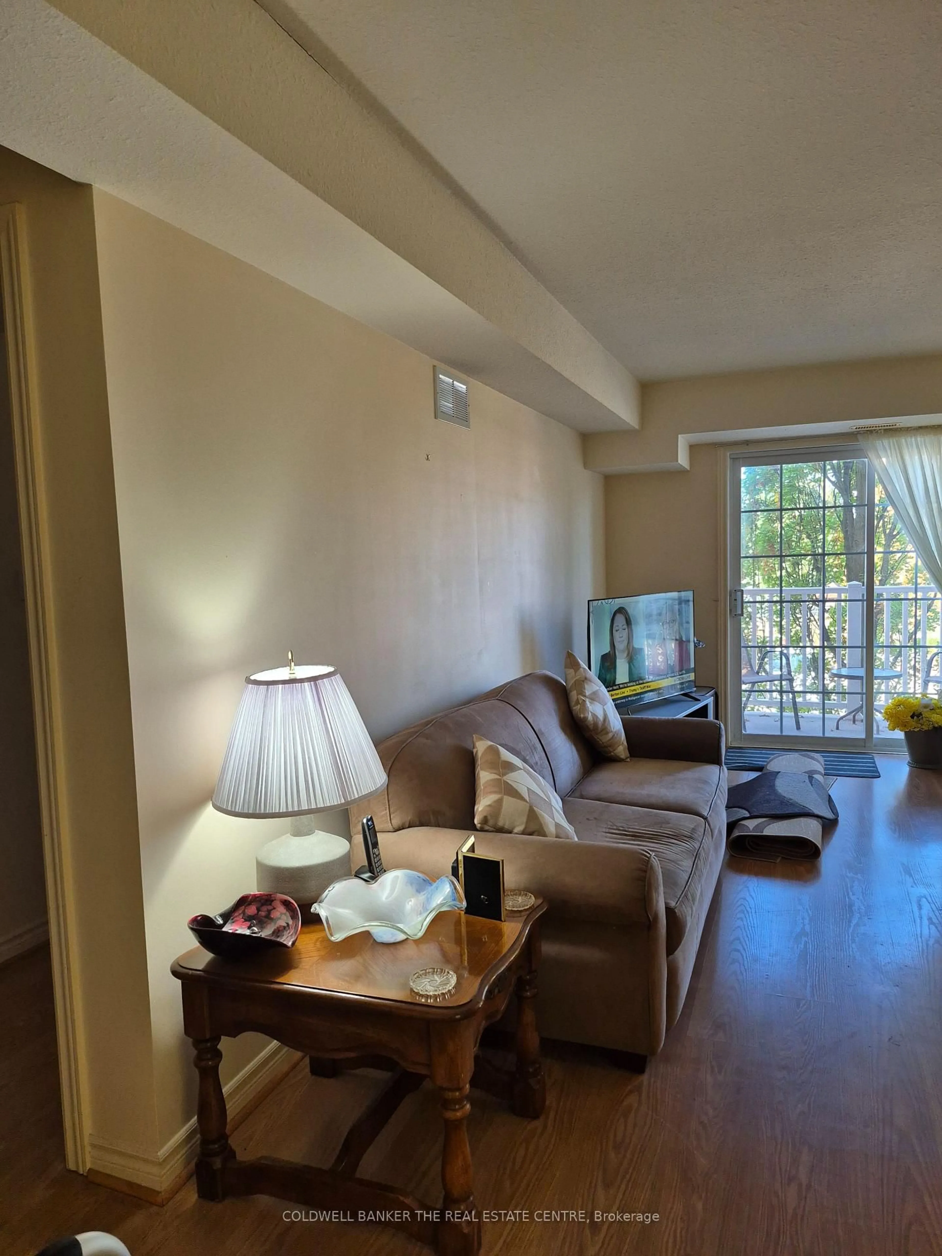 Living room with furniture, unknown for 49 Jacobs Terr #212, Barrie Ontario L4N 0W4
