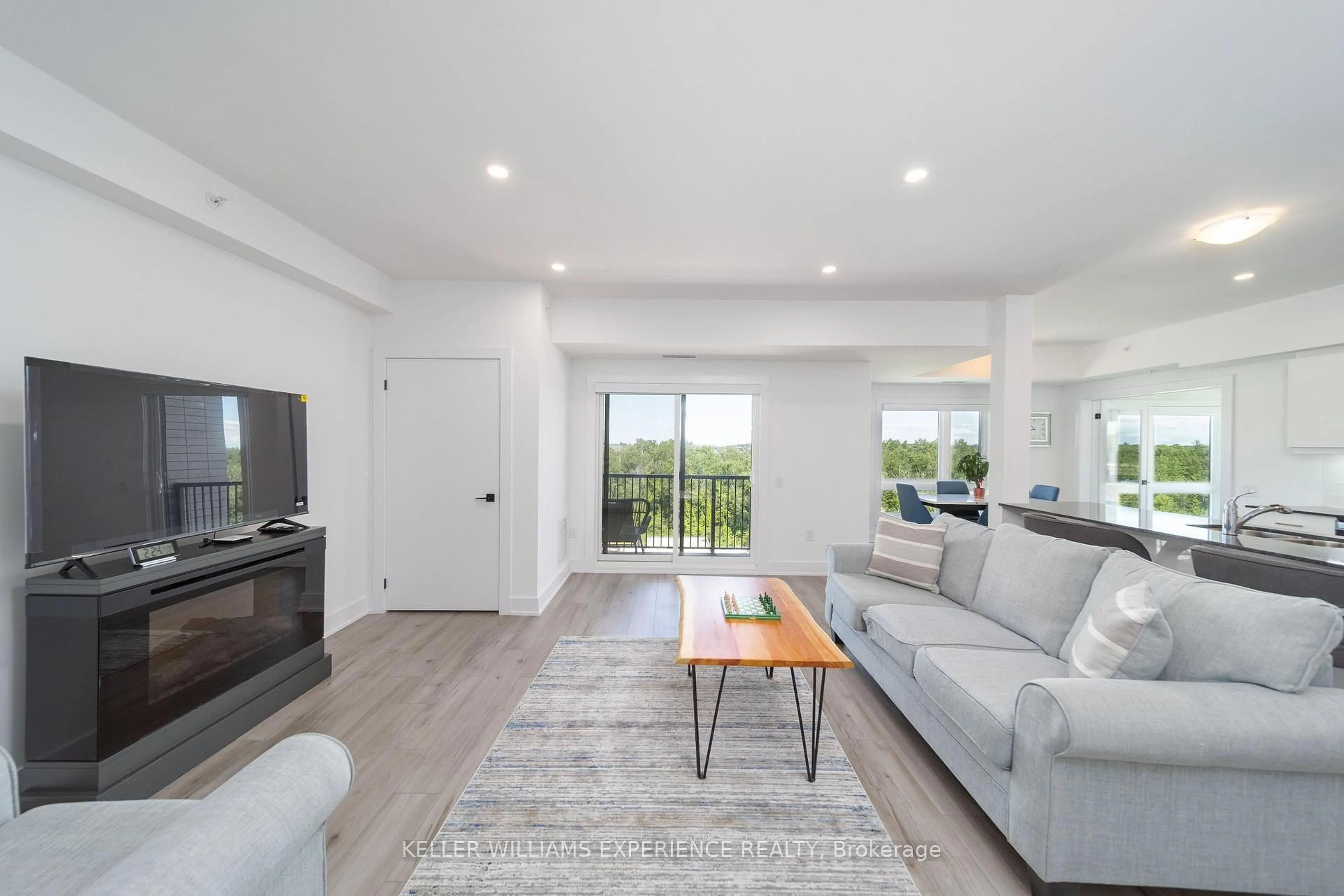 Living room with furniture, unknown for 8 Culinary Lane #401, Barrie Ontario L9J 0T2