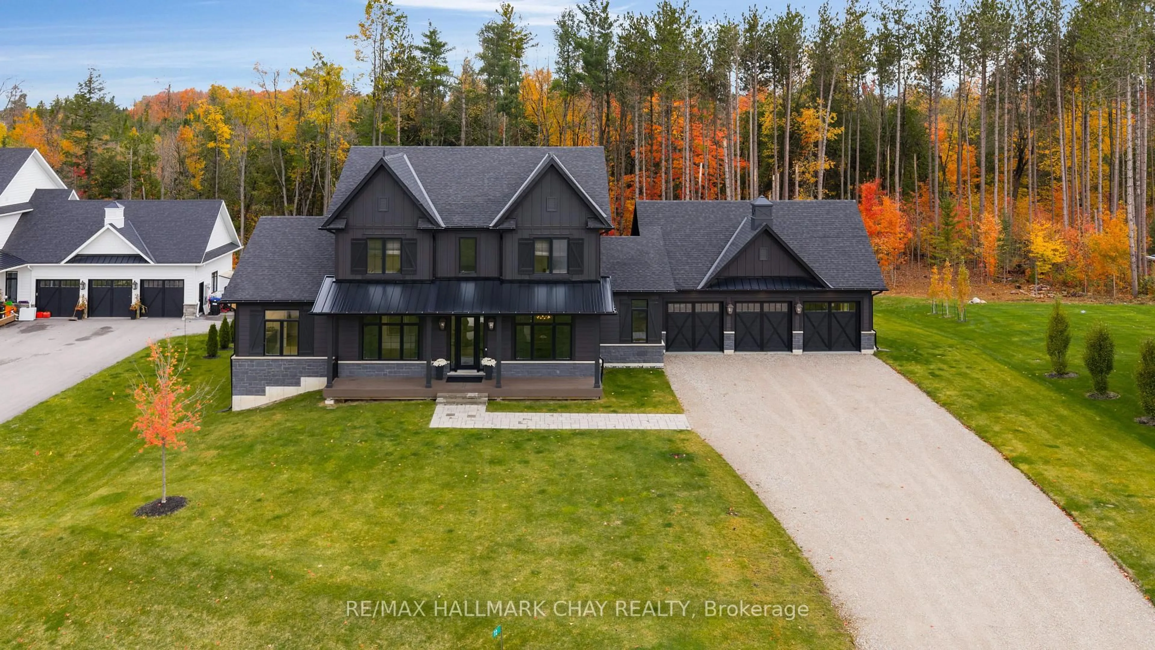 A pic from outside/outdoor area/front of a property/back of a property/a pic from drone, street for 72 Georgian Grande Dr, Oro-Medonte Ontario L0K 1E0