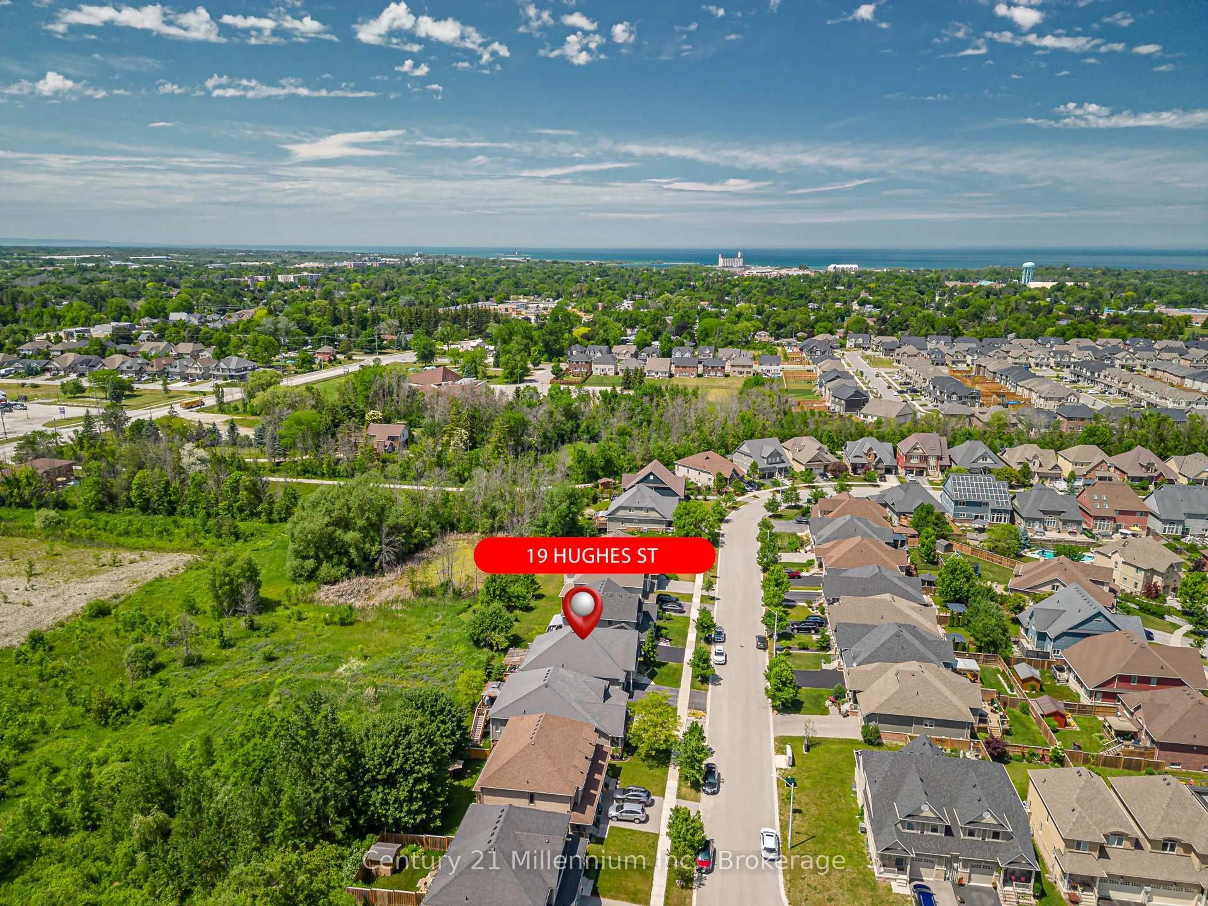A pic from outside/outdoor area/front of a property/back of a property/a pic from drone, unknown for 19 Hughes St, Collingwood Ontario L9Y 0W7