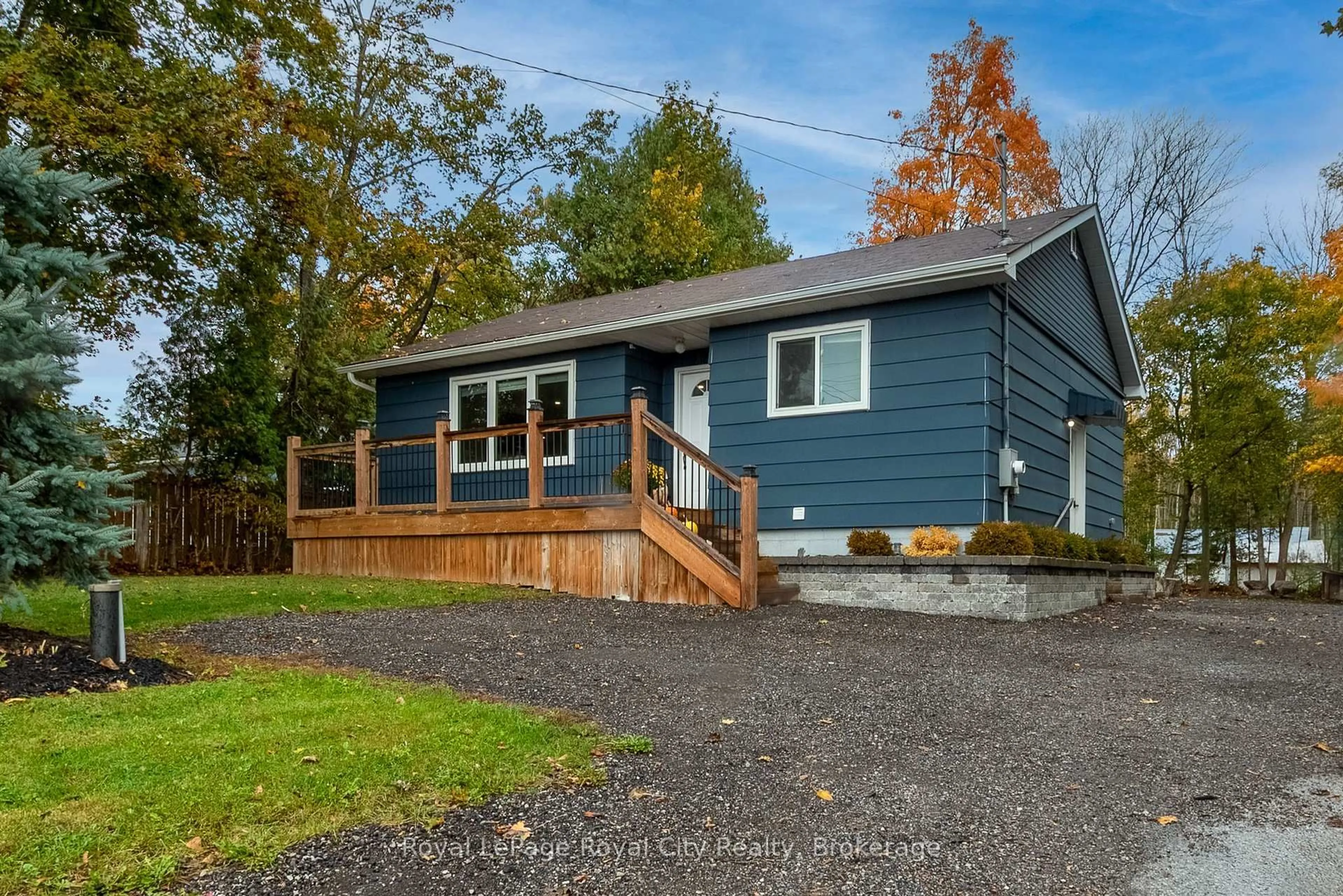 Home with vinyl exterior material, street for 3697 George Johnston Rd, Springwater Ontario L4M 4S4