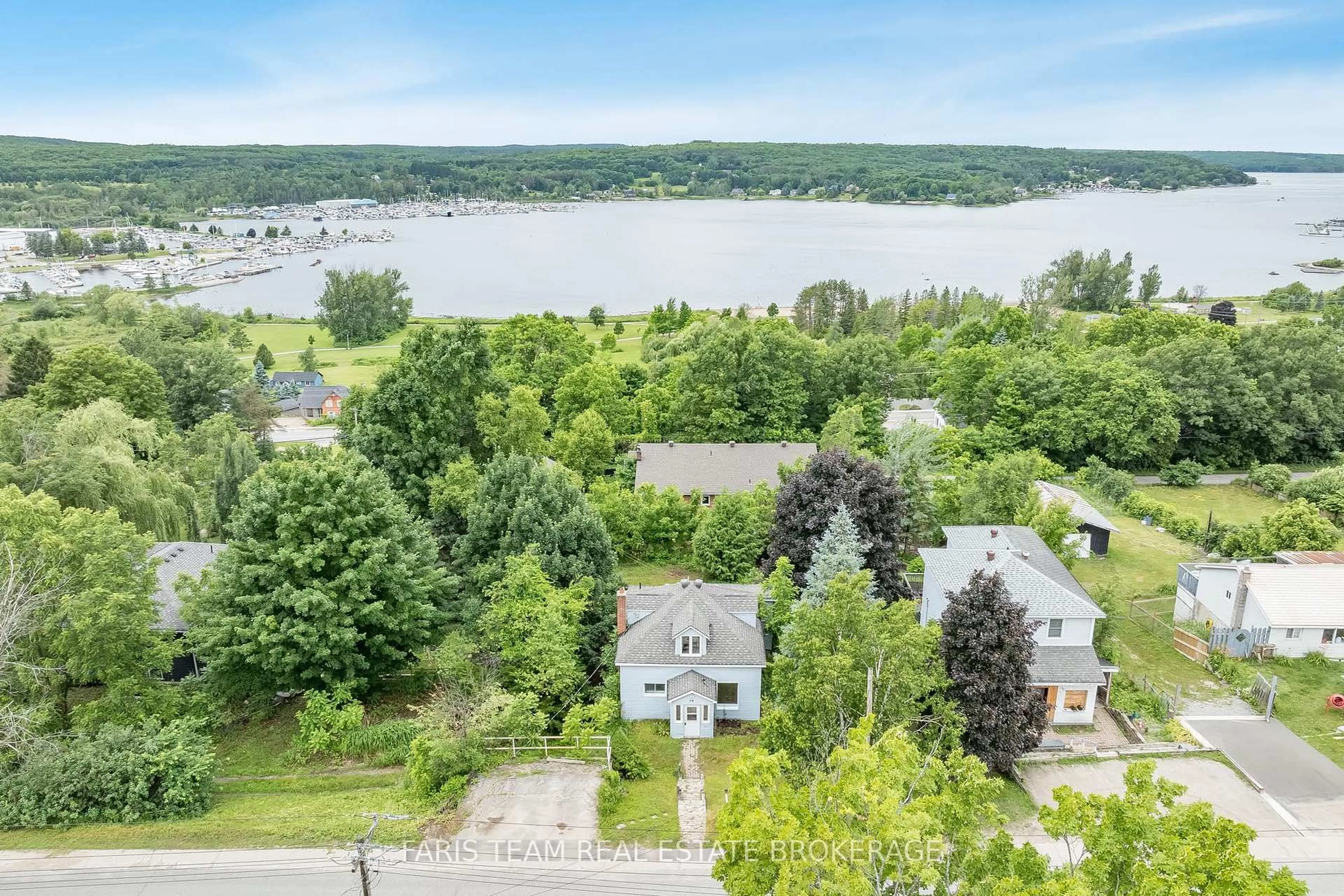 A pic from outside/outdoor area/front of a property/back of a property/a pic from drone, water/lake/river/ocean view for 79 Poyntz St, Penetanguishene Ontario L9M 1N9
