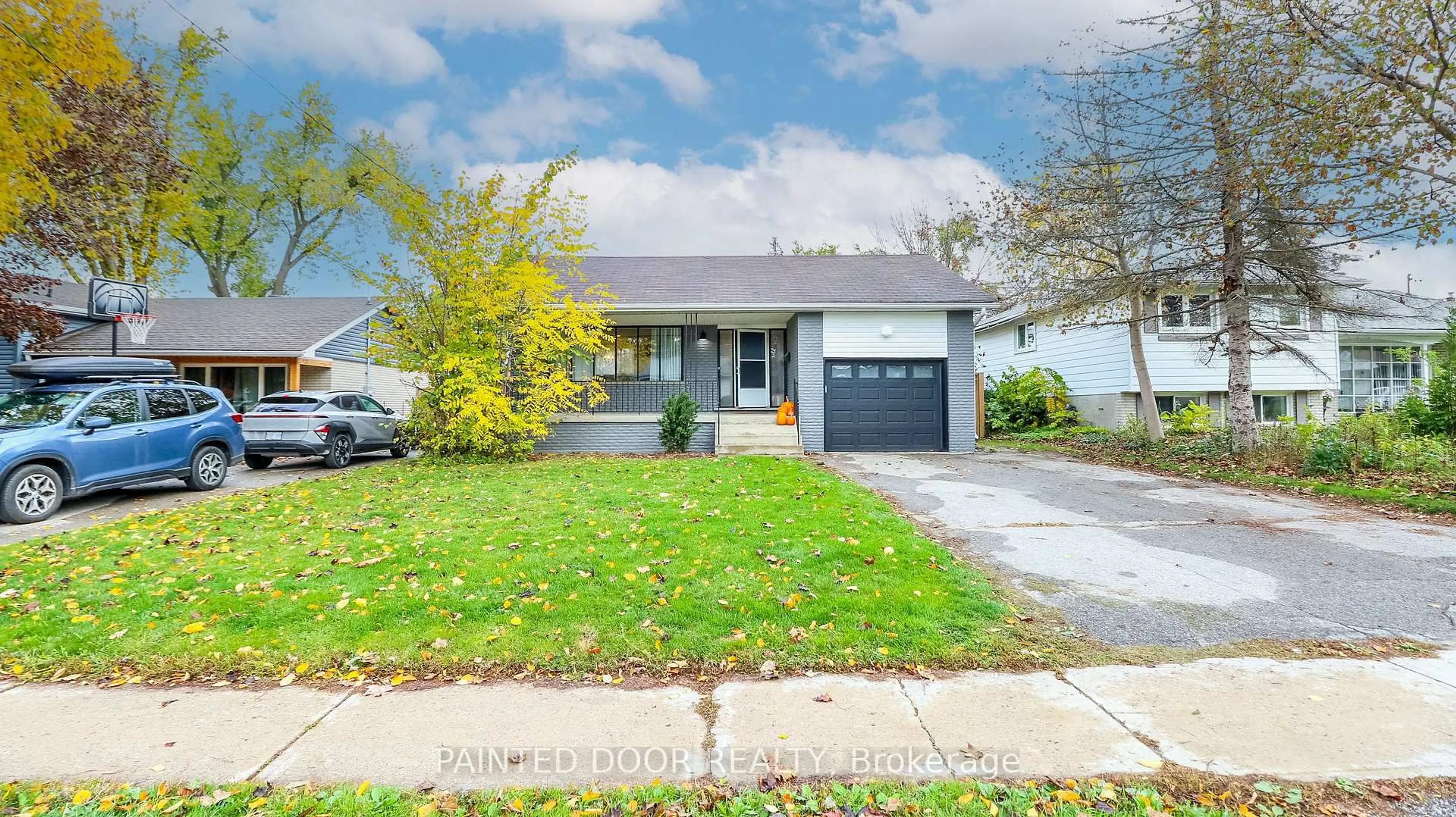 Home with vinyl exterior material, street for 14 Steel St, Barrie Ontario L4M 2E5
