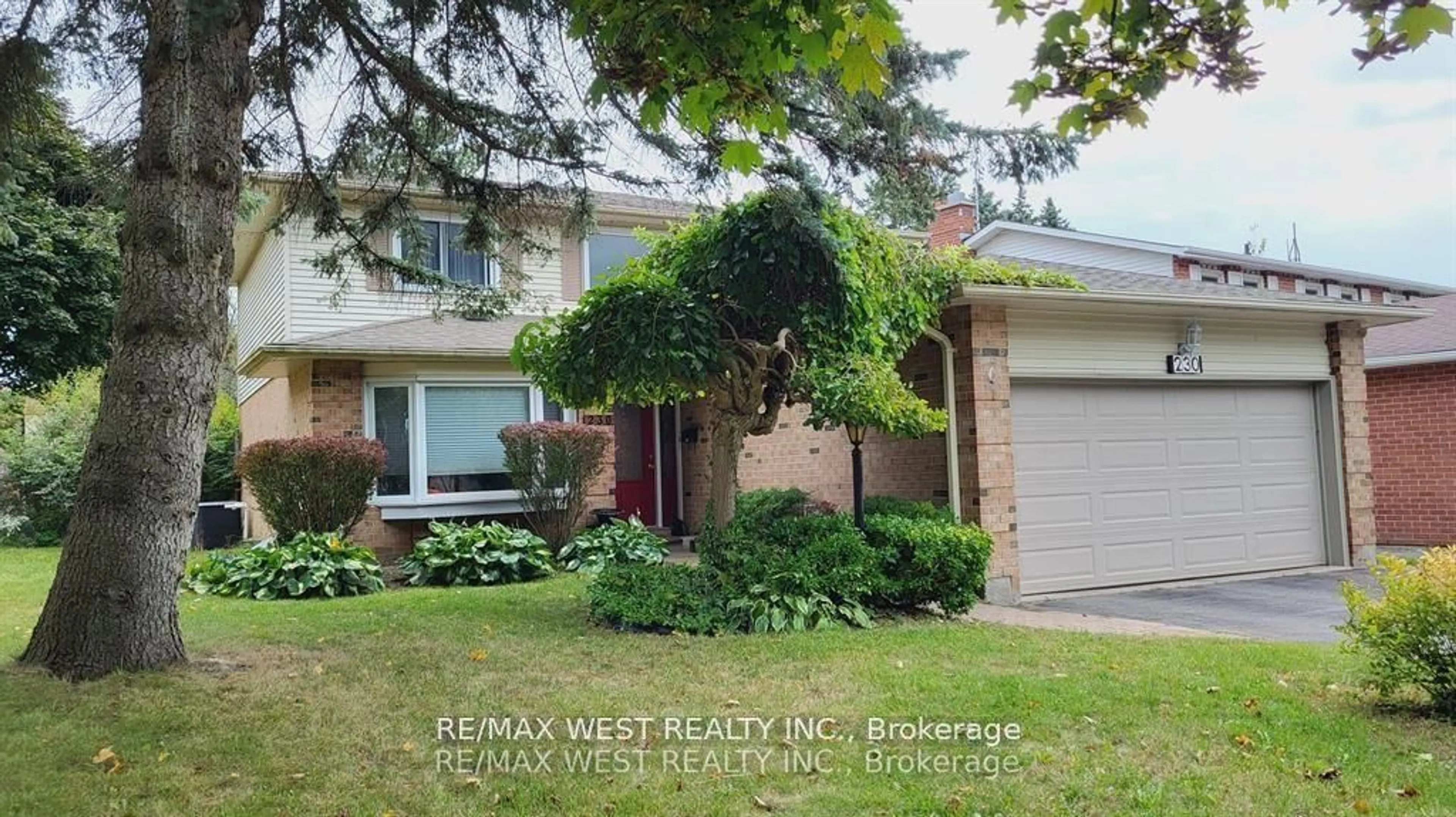 Home with brick exterior material, street for 230 Browning Tr, Barrie Ontario L4N 5J7