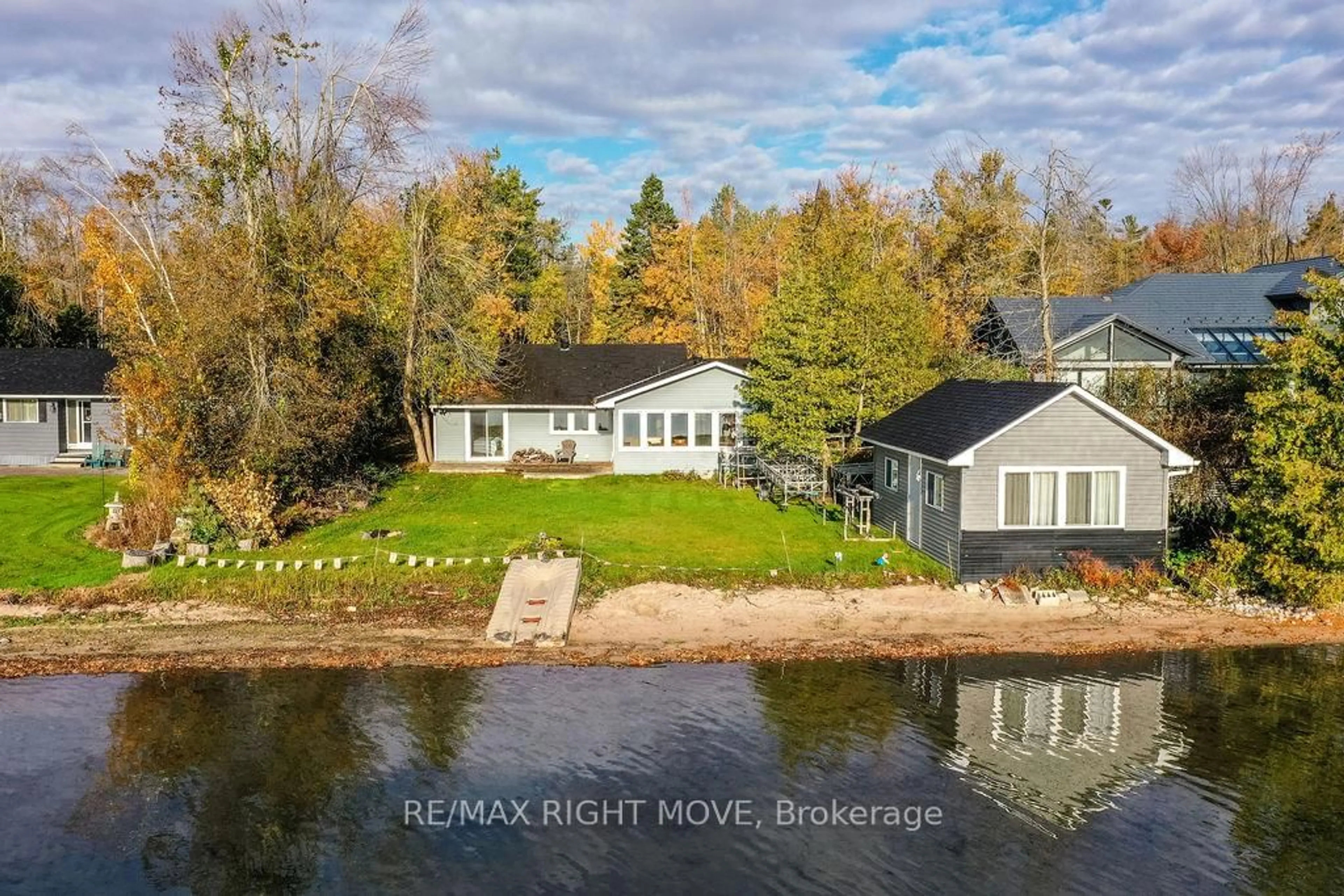 A pic from outside/outdoor area/front of a property/back of a property/a pic from drone, water/lake/river/ocean view for 1467 Cunningham Cres, Severn Ontario L3V 7E1