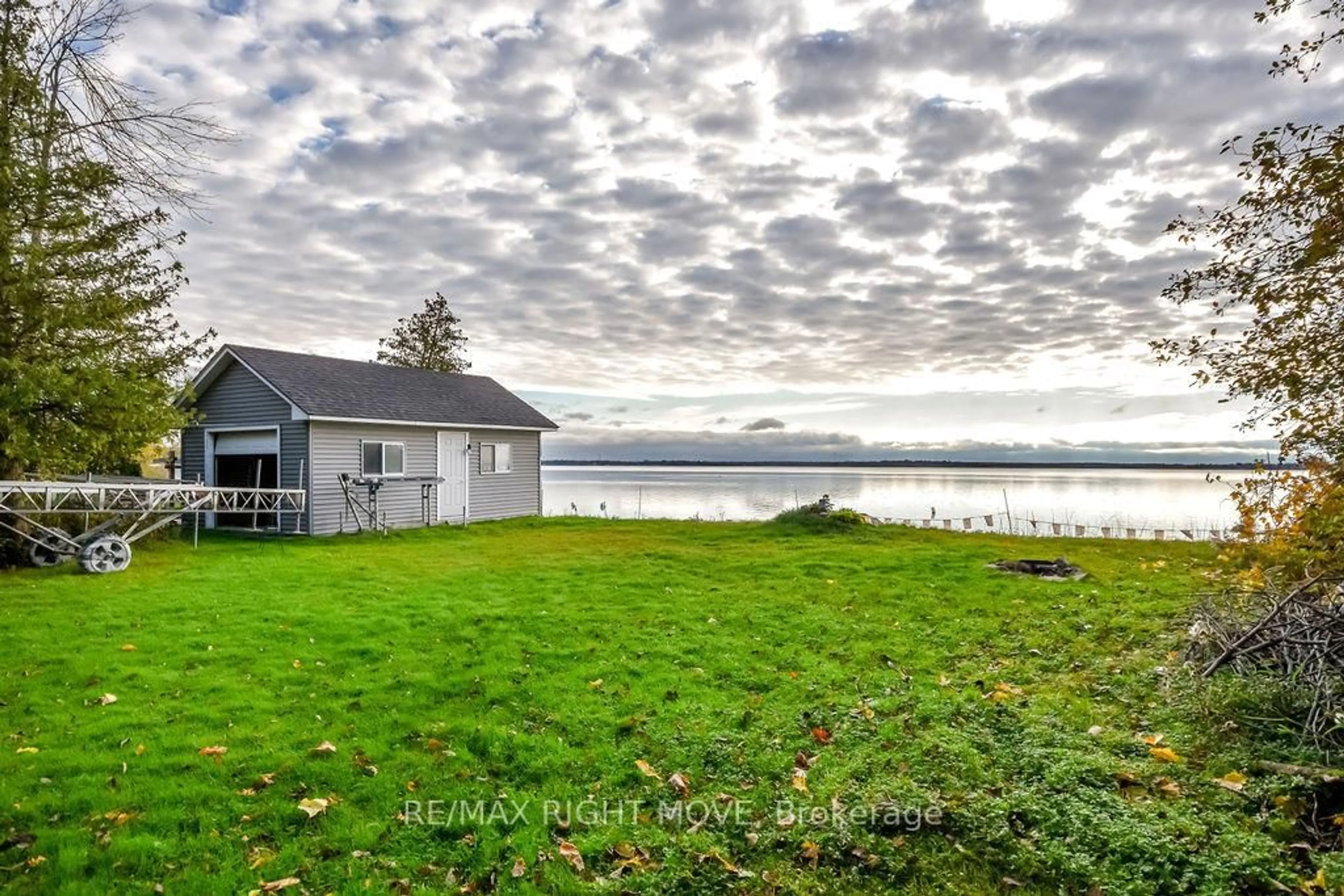 A pic from outside/outdoor area/front of a property/back of a property/a pic from drone, water/lake/river/ocean view for 1467 Cunningham Cres, Severn Ontario L3V 7E1