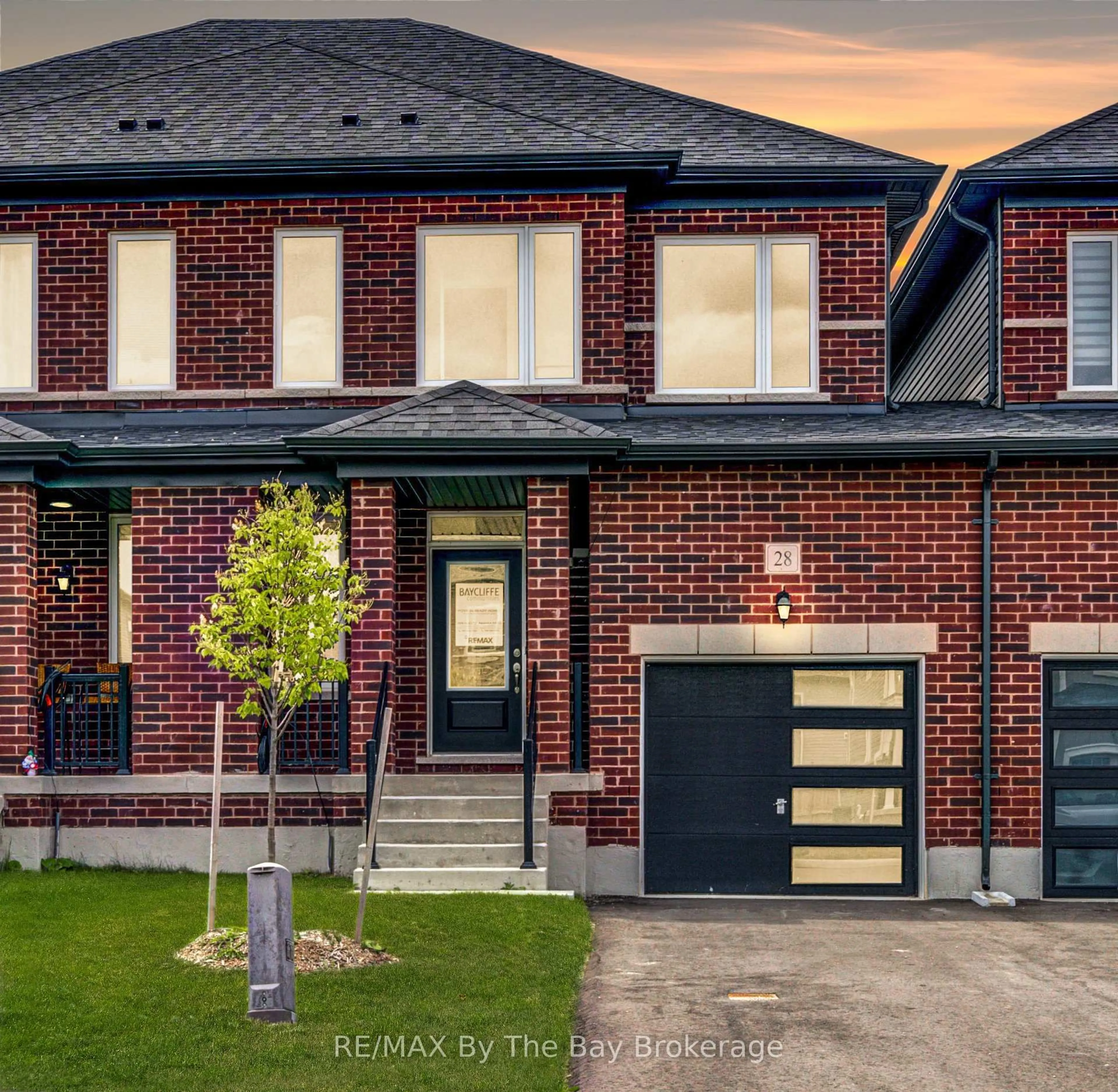 Home with brick exterior material, street for 28 Autumn Dr, Wasaga Beach Ontario L9Z 0K7