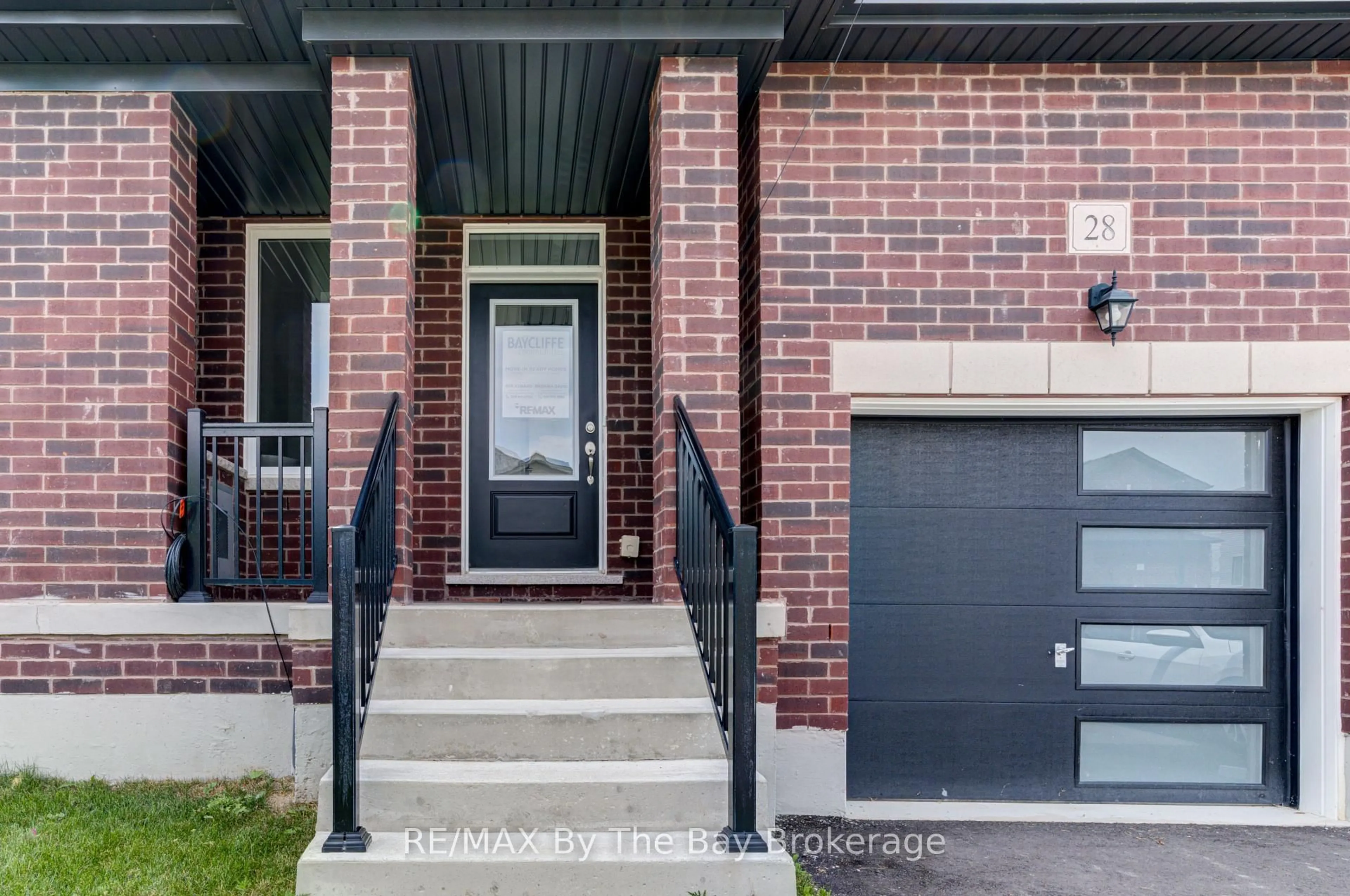 Home with brick exterior material, street for 28 Autumn Dr, Wasaga Beach Ontario L9Z 0K7