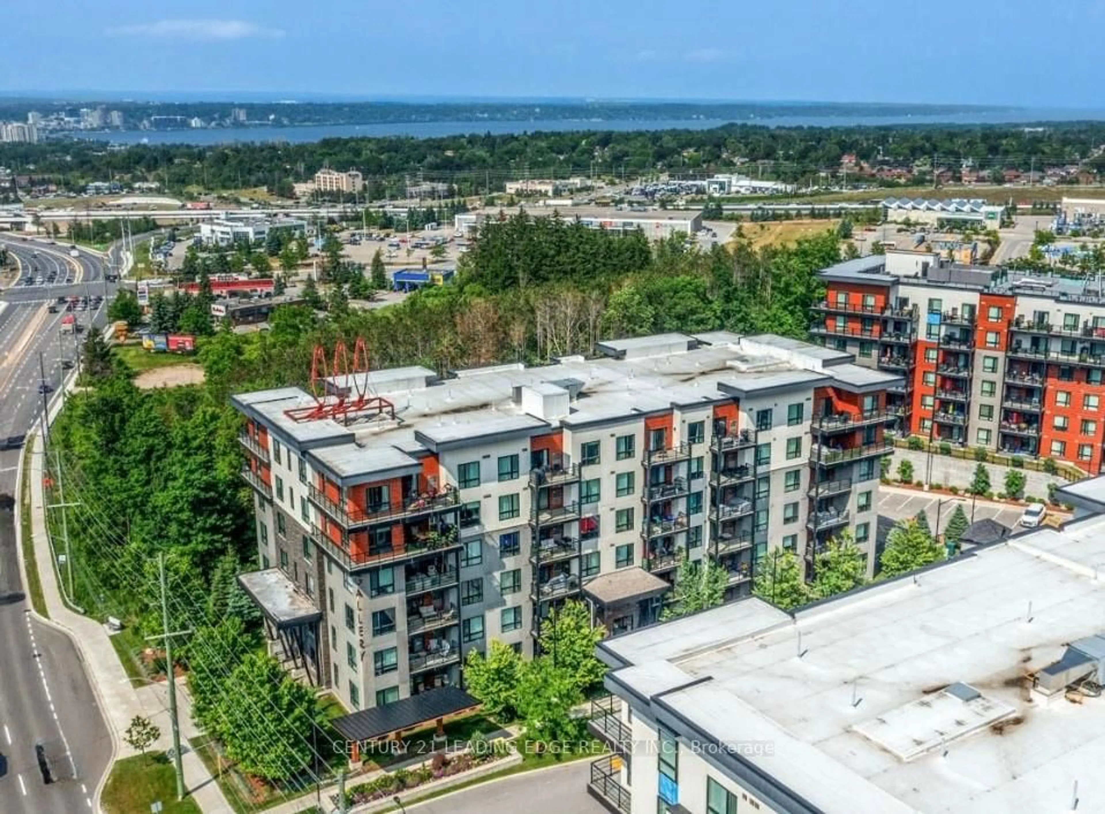 A pic from outside/outdoor area/front of a property/back of a property/a pic from drone, city buildings view from balcony for 300 ESSA RD #209, Barrie Ontario L9J 0B9