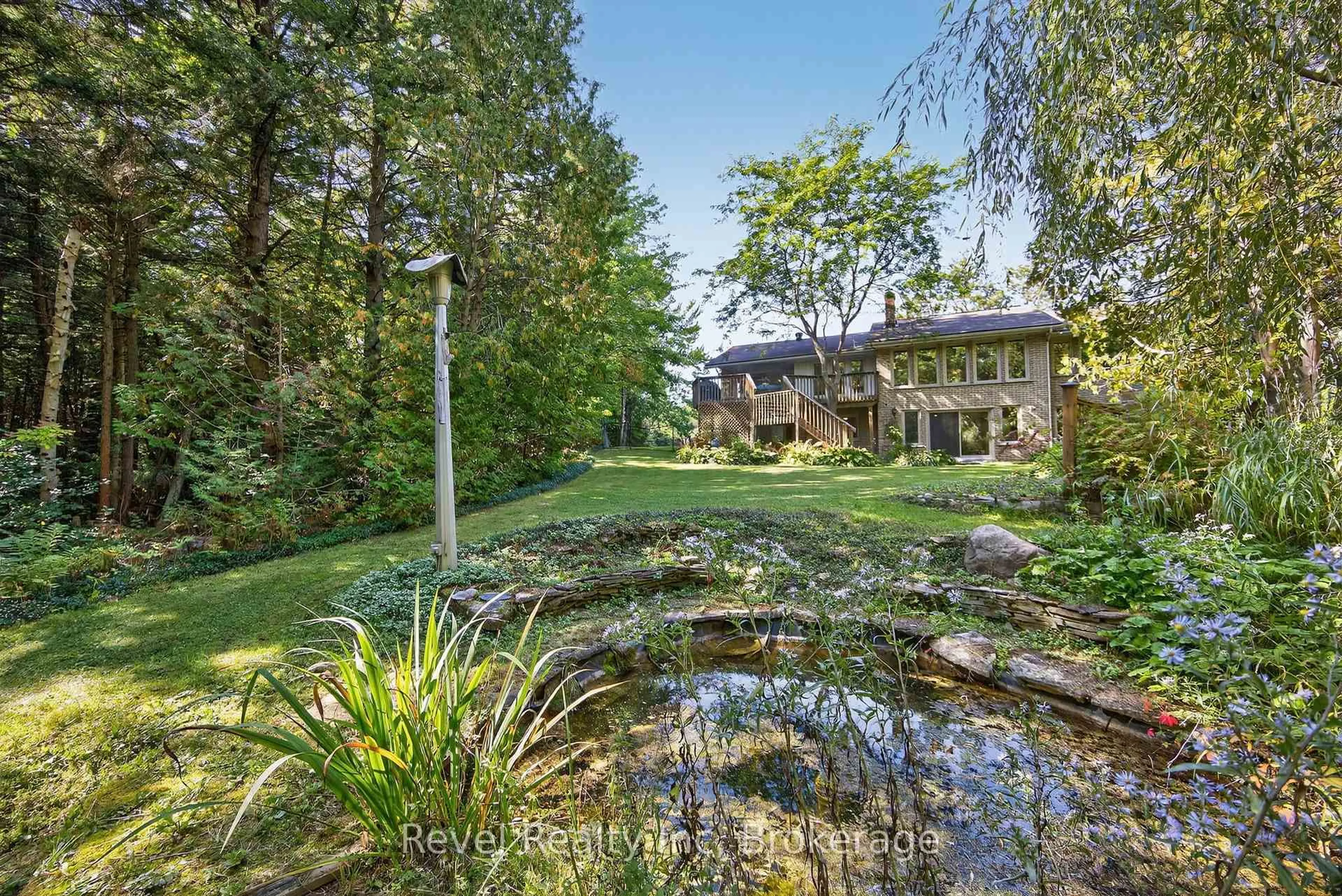 A pic from outside/outdoor area/front of a property/back of a property/a pic from drone, water/lake/river/ocean view for 7190 93 Highway, Tiny Ontario L0K 2E1