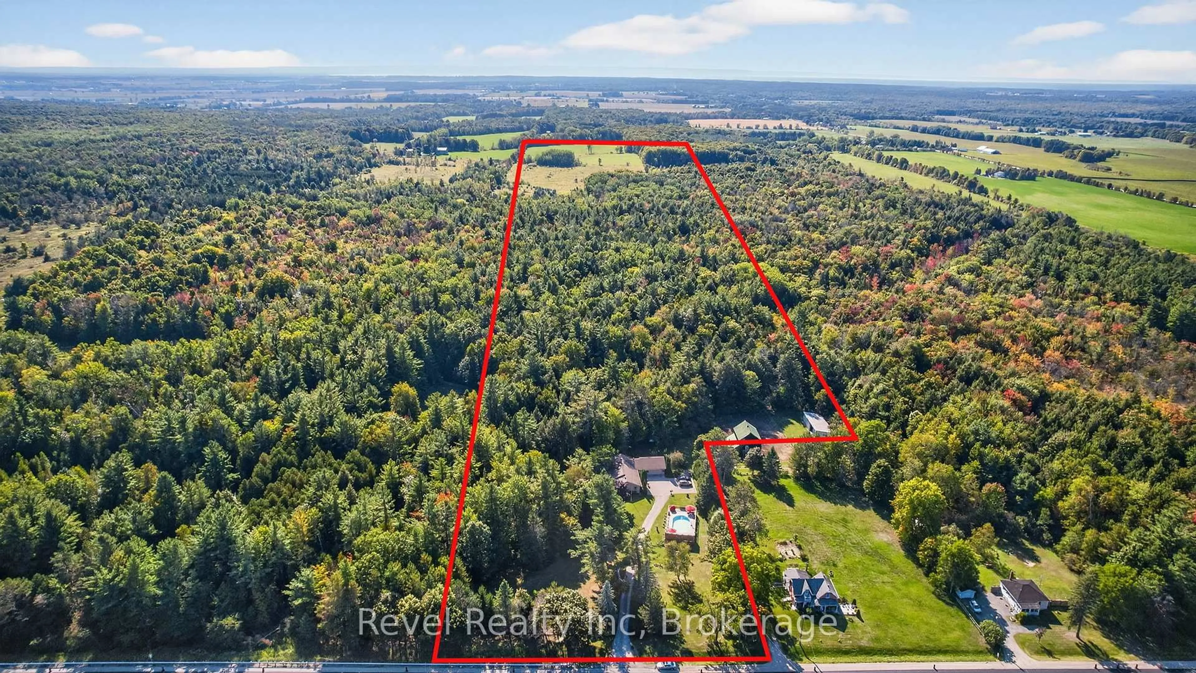 A pic from outside/outdoor area/front of a property/back of a property/a pic from drone, forest/trees view for 7190 93 Highway, Tiny Ontario L0K 2E1