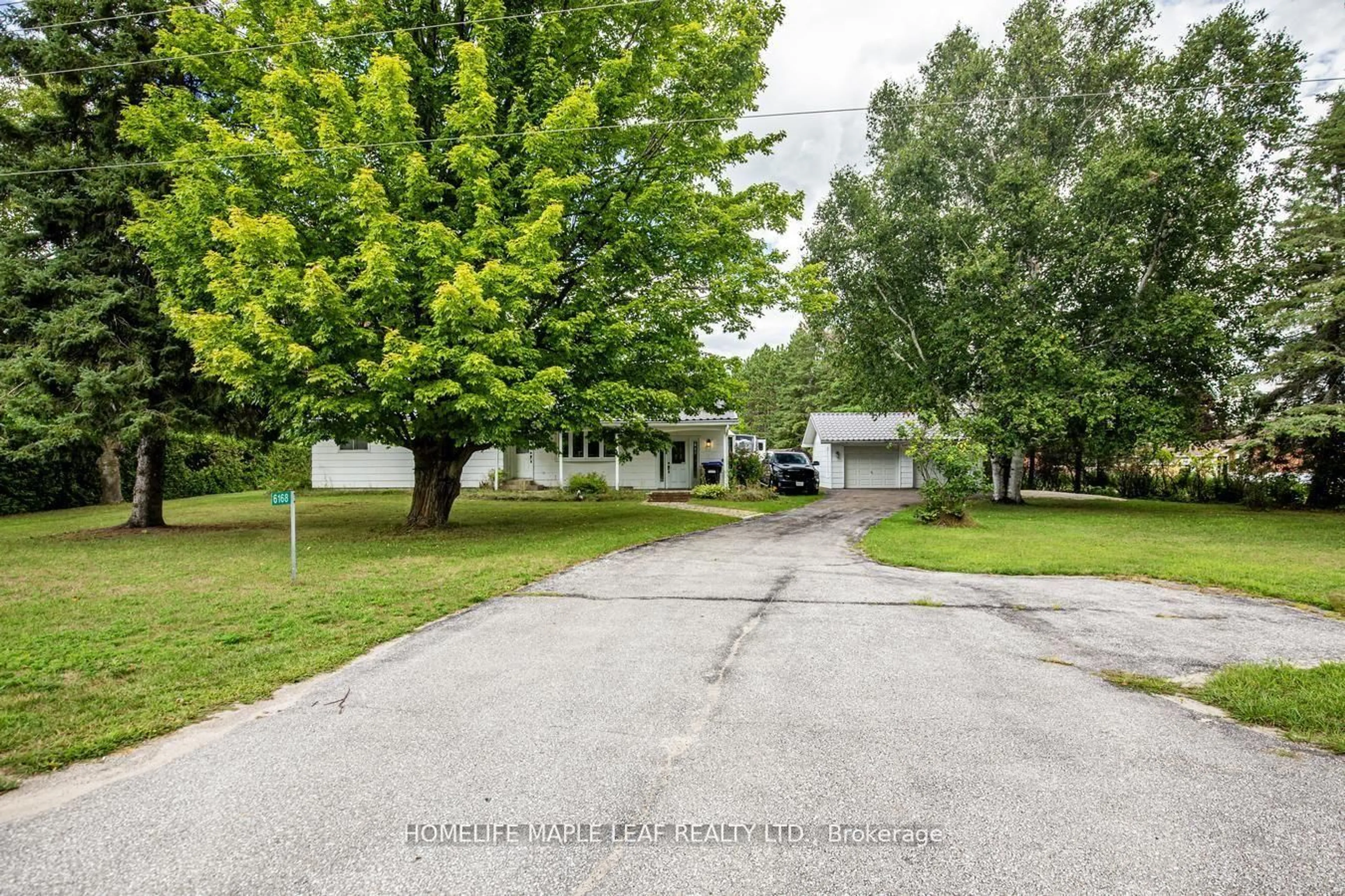 A pic from outside/outdoor area/front of a property/back of a property/a pic from drone, street for 6168 County Road 9, Clearview Ontario L0M 1N0