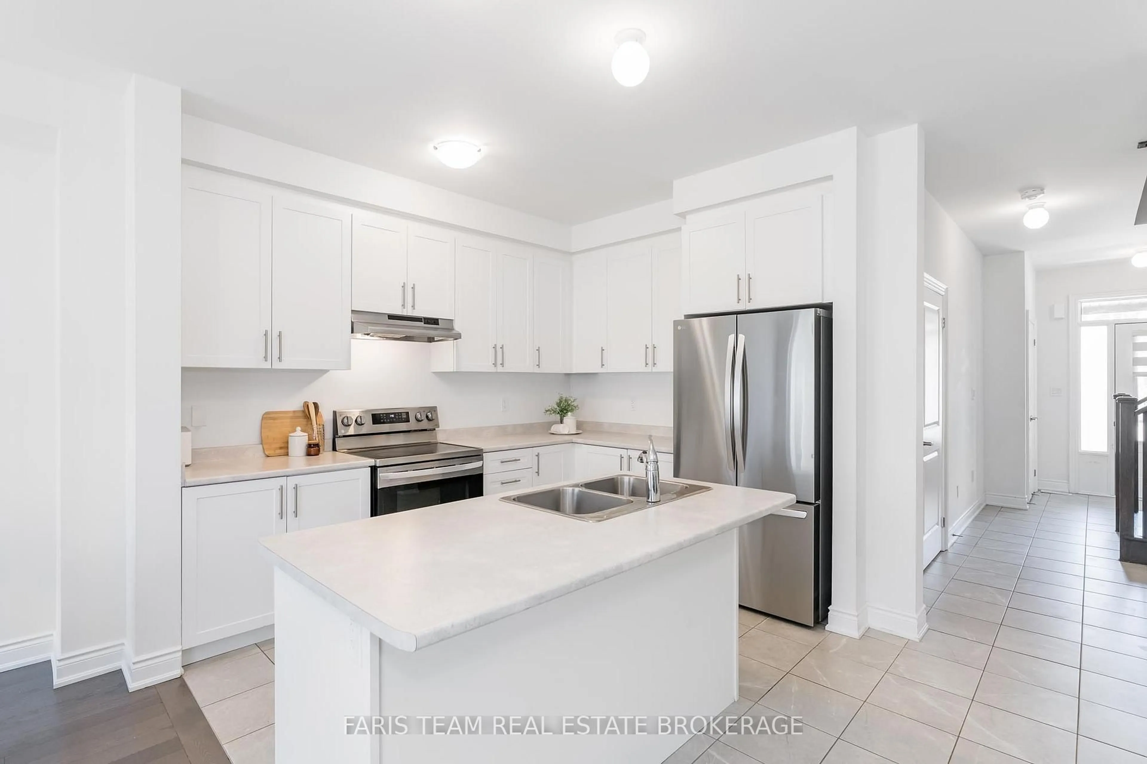 Open concept kitchen, ceramic/tile floor for 7 Lisa St, Wasaga Beach Ontario L9Z 0K9