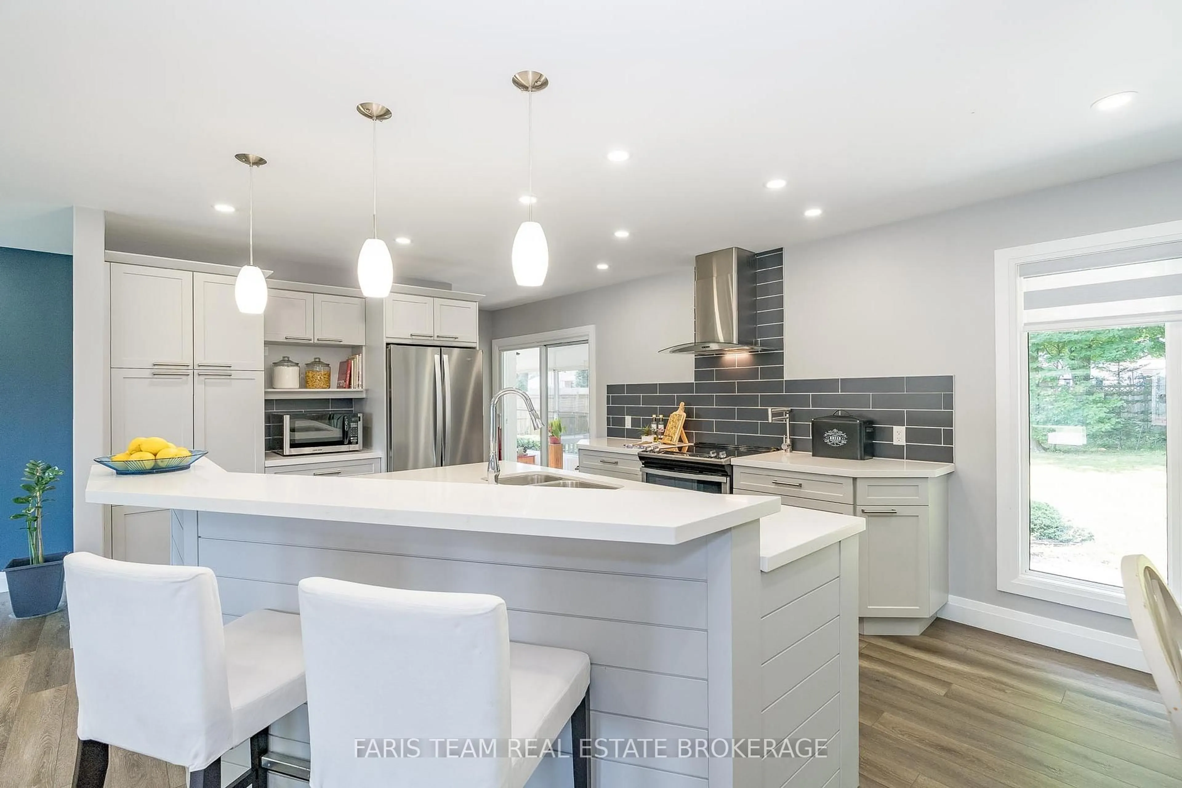 Open concept kitchen, ceramic/tile floor for 888 Hugel Ave, Midland Ontario L4R 1X6