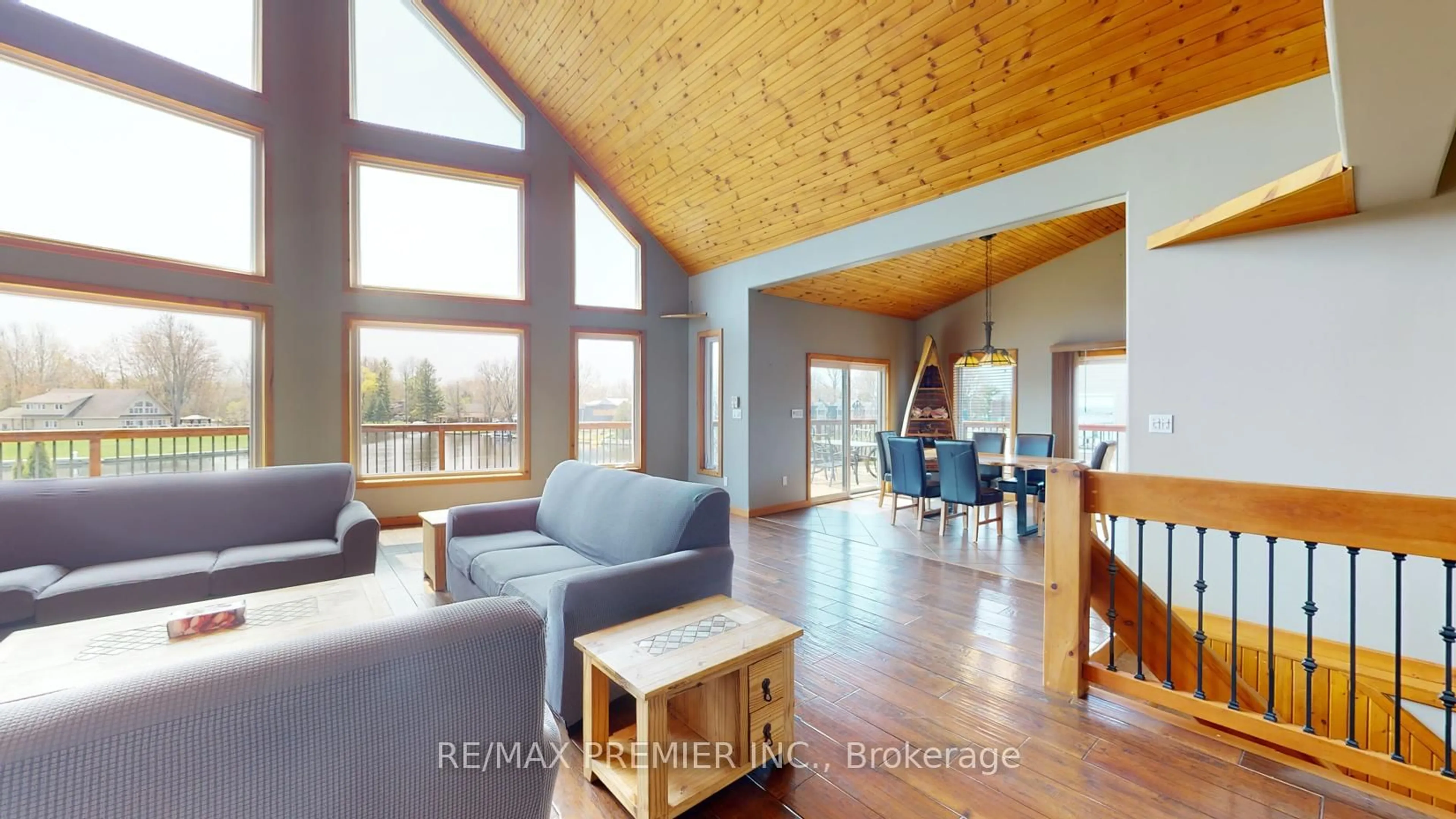 Living room with furniture, wood/laminate floor for 31 Paradise Blvd, Ramara Ontario L0K 1B0