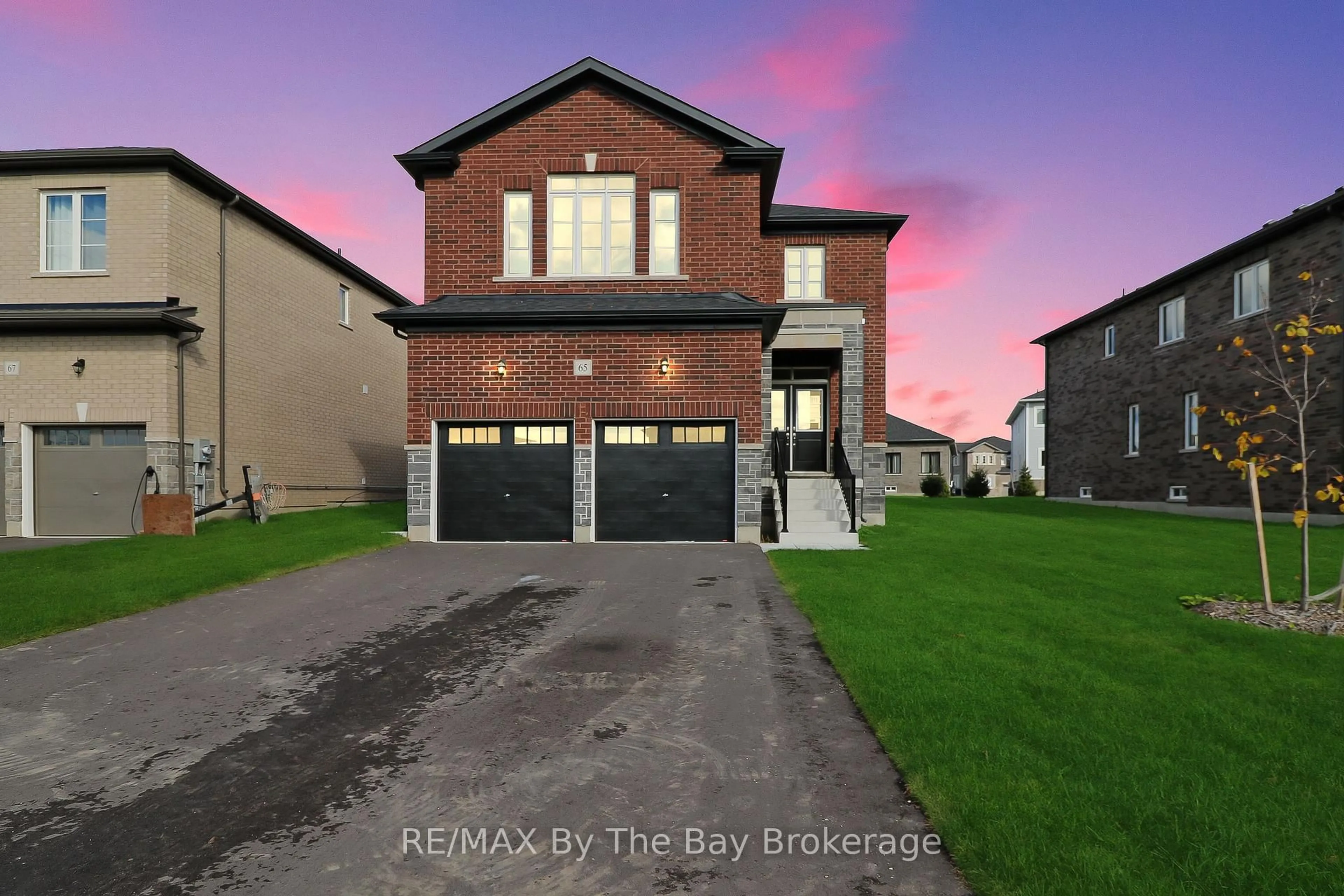 Home with brick exterior material, street for 65 Amber Dr, Wasaga Beach Ontario L9Z 0R9