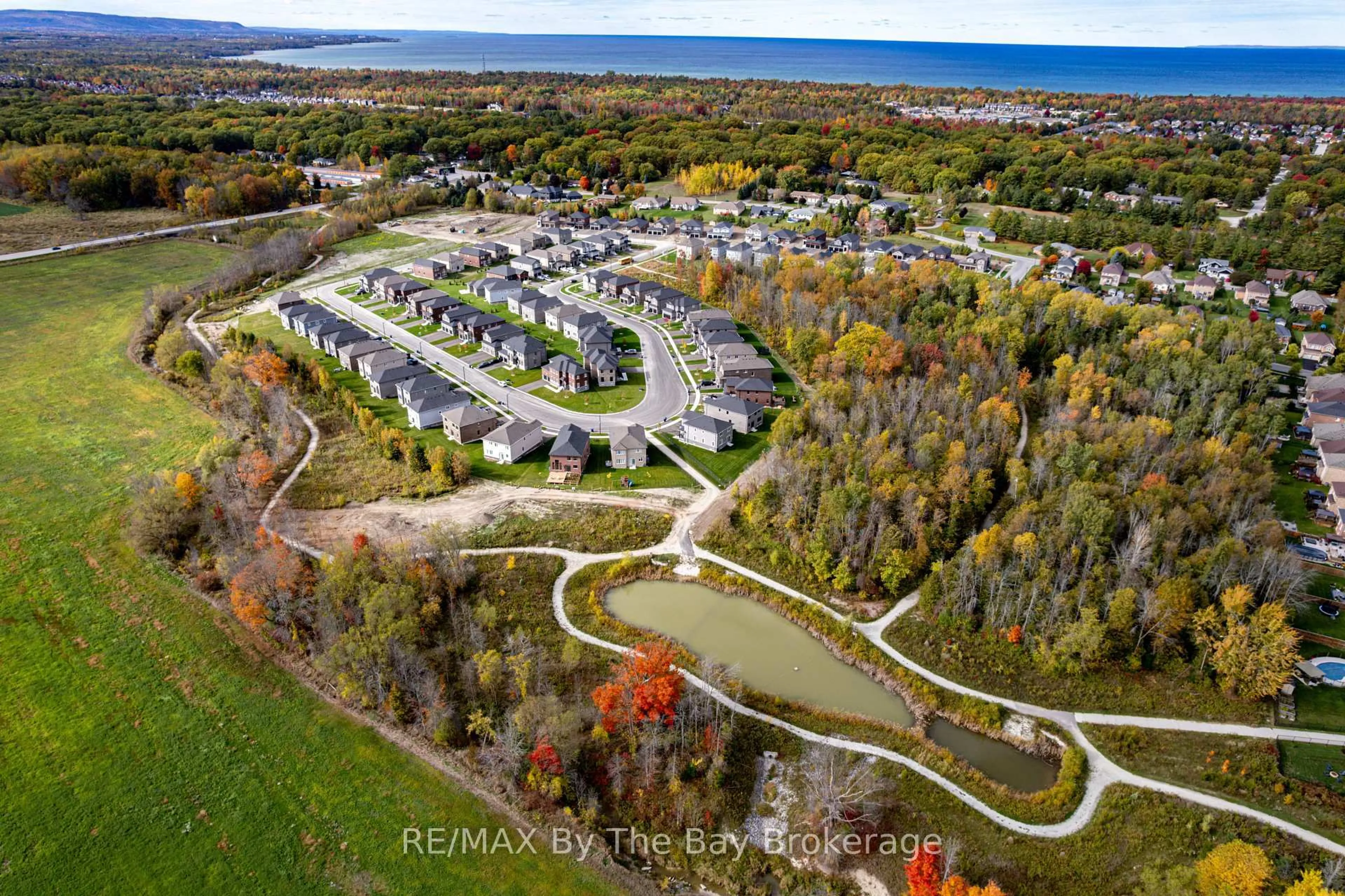 A pic from outside/outdoor area/front of a property/back of a property/a pic from drone, water/lake/river/ocean view for 65 Amber Dr, Wasaga Beach Ontario L9Z 0R9