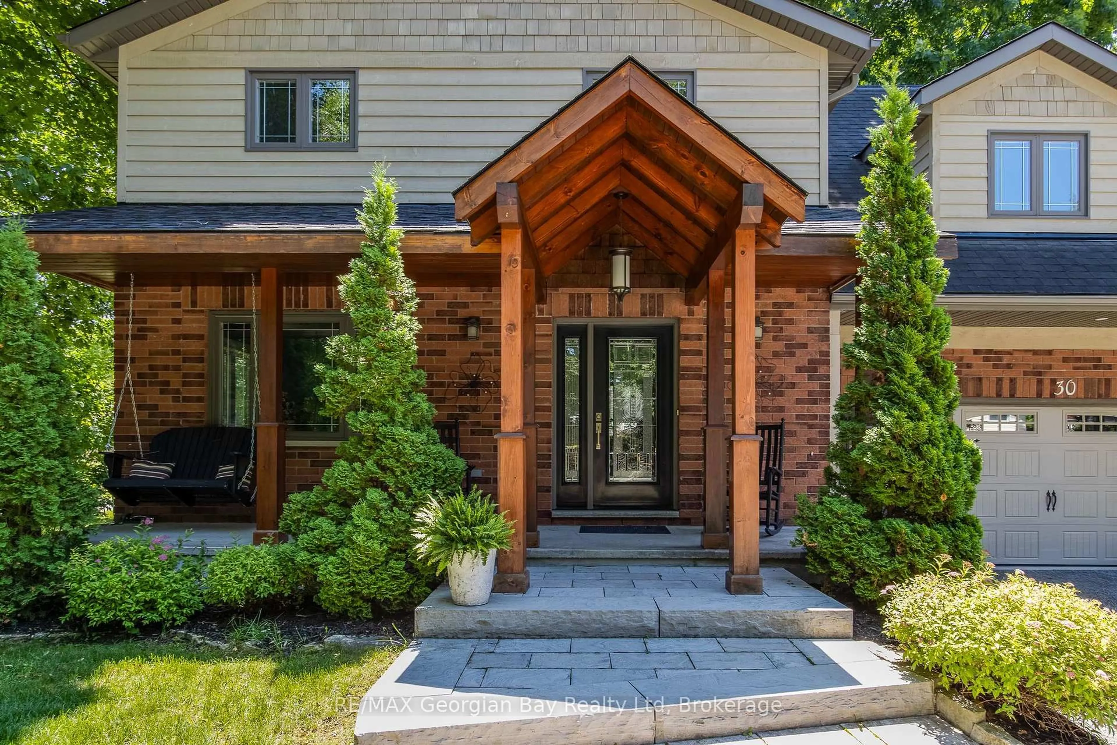 Home with brick exterior material, street for 30 Brule St, Penetanguishene Ontario L9M 1J1