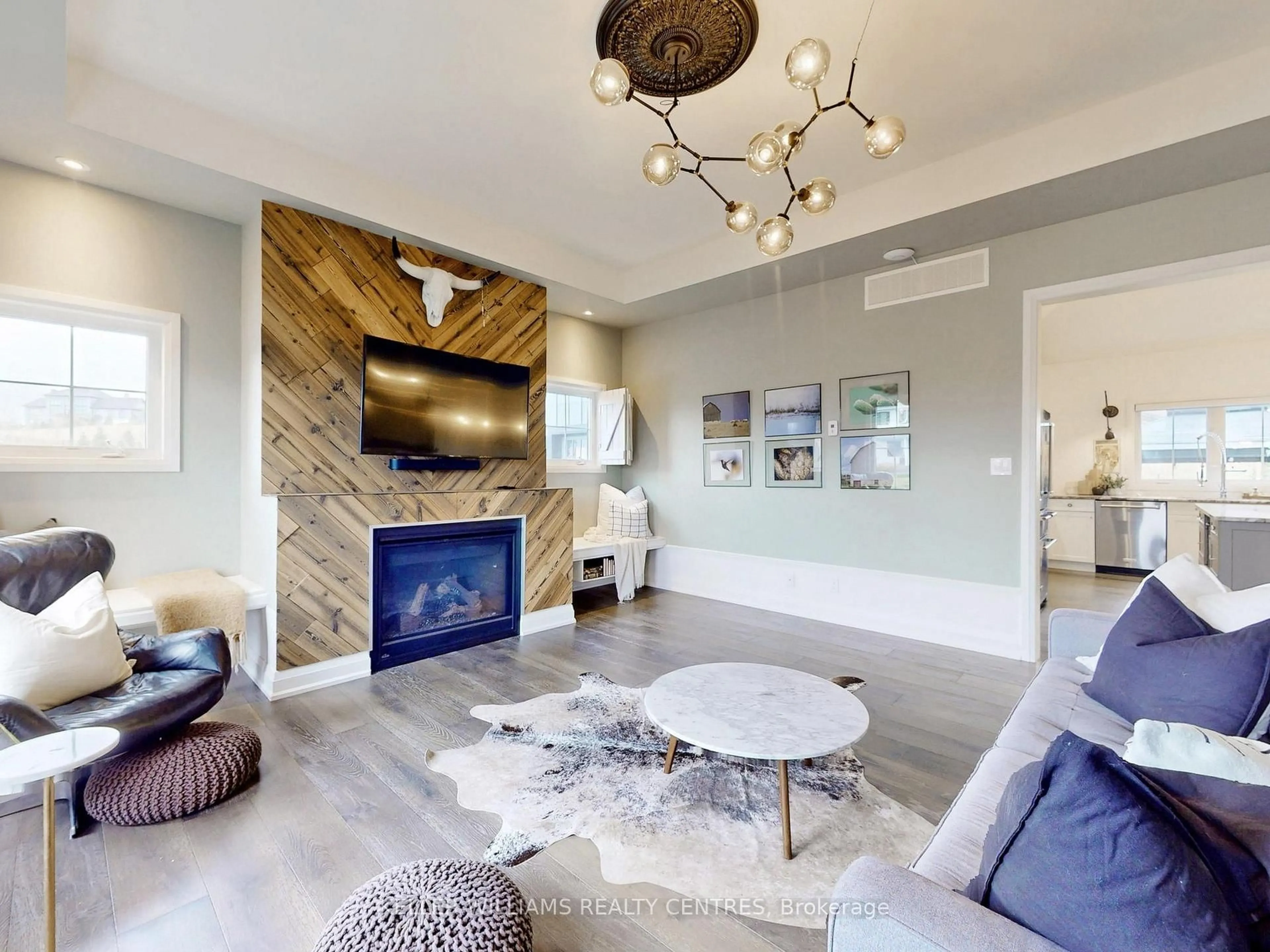 Living room with furniture, unknown for 2 Thoroughbred Dr, Oro-Medonte Ontario L0K 1E0