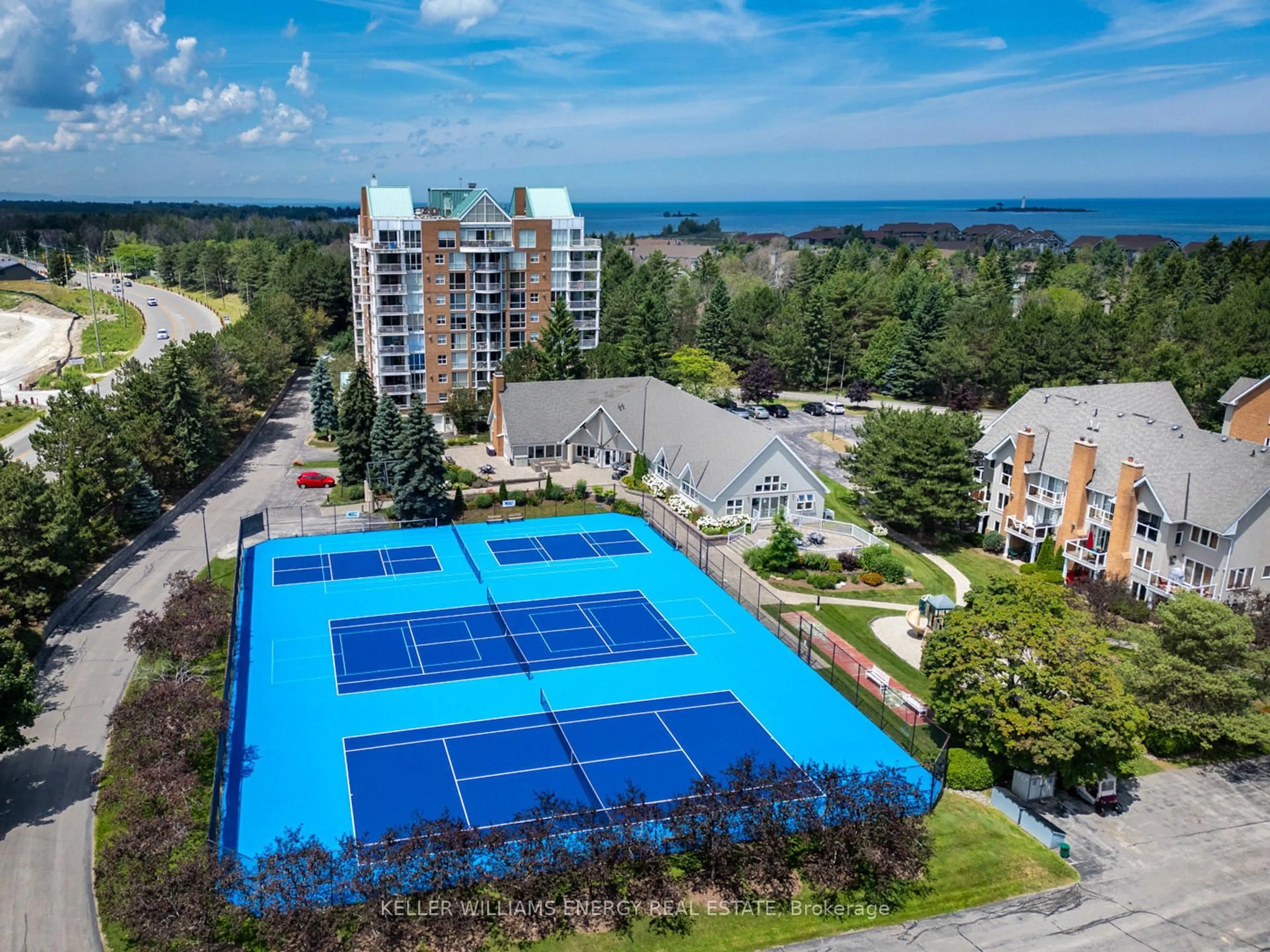 A pic from outside/outdoor area/front of a property/back of a property/a pic from drone, water/lake/river/ocean view for 24 Ramblings Way #901, Collingwood Ontario L9Y 5C6