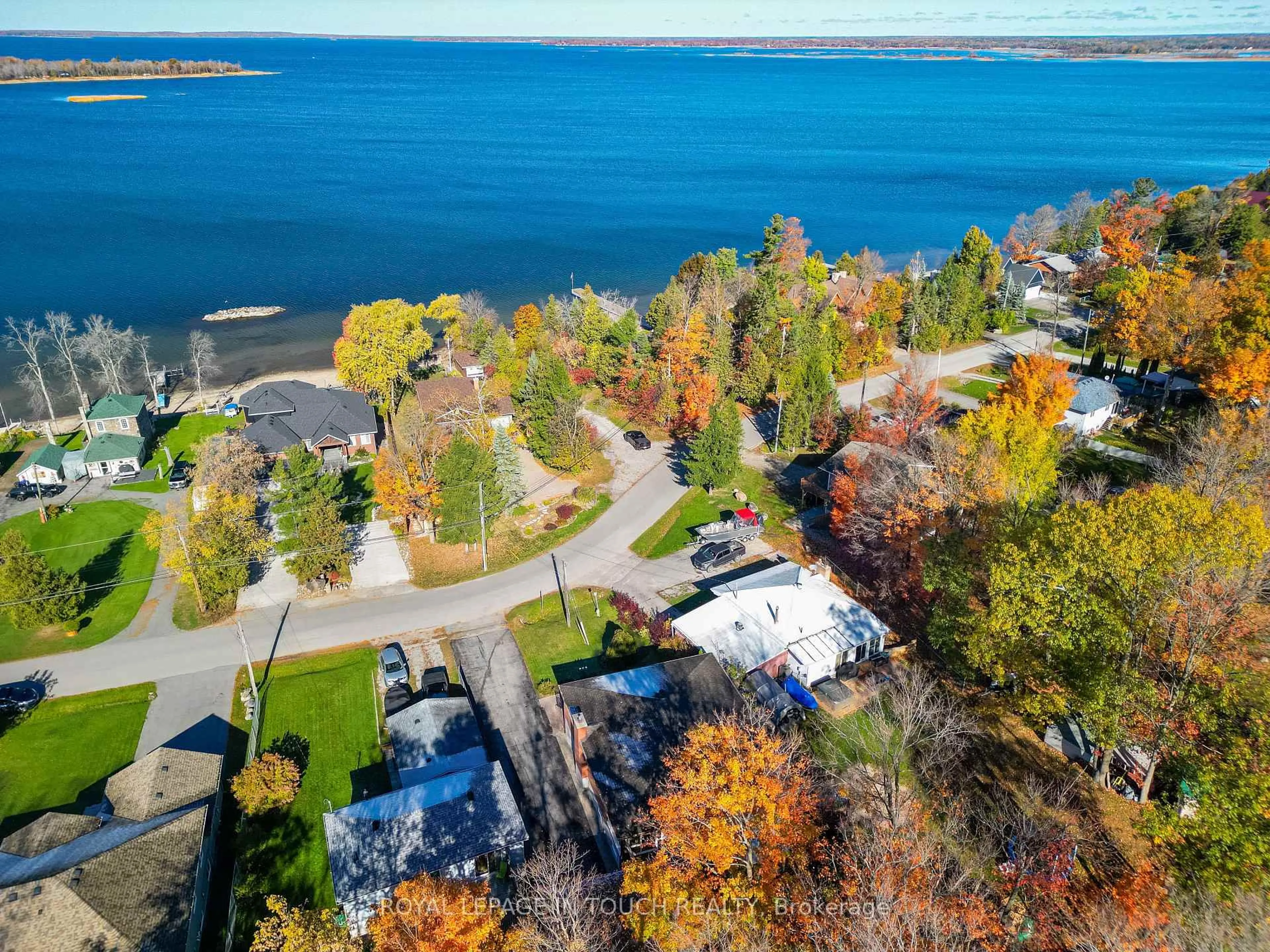 A pic from outside/outdoor area/front of a property/back of a property/a pic from drone, water/lake/river/ocean view for 21 Robins Point Rd, Tay Ontario L0K 2A0