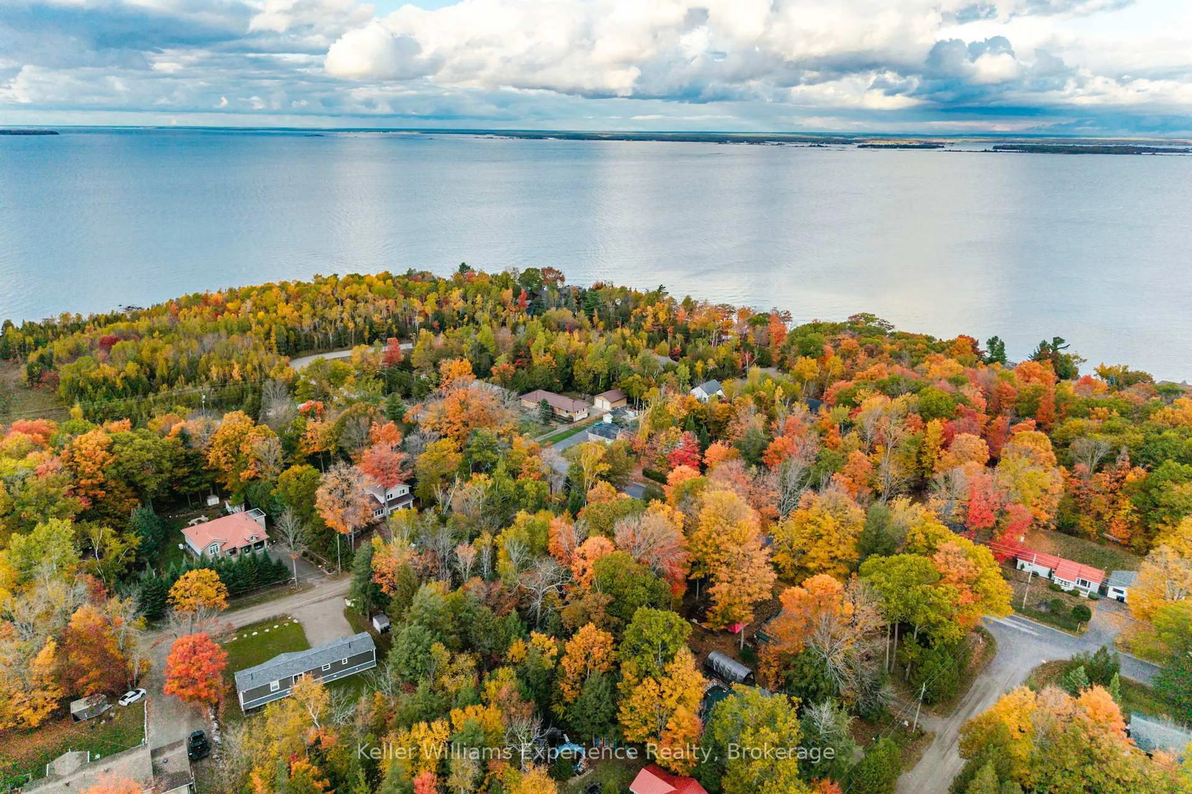 A pic from outside/outdoor area/front of a property/back of a property/a pic from drone, water/lake/river/ocean view for 1 Wigwam Tr, Tiny Ontario L9M 0B1