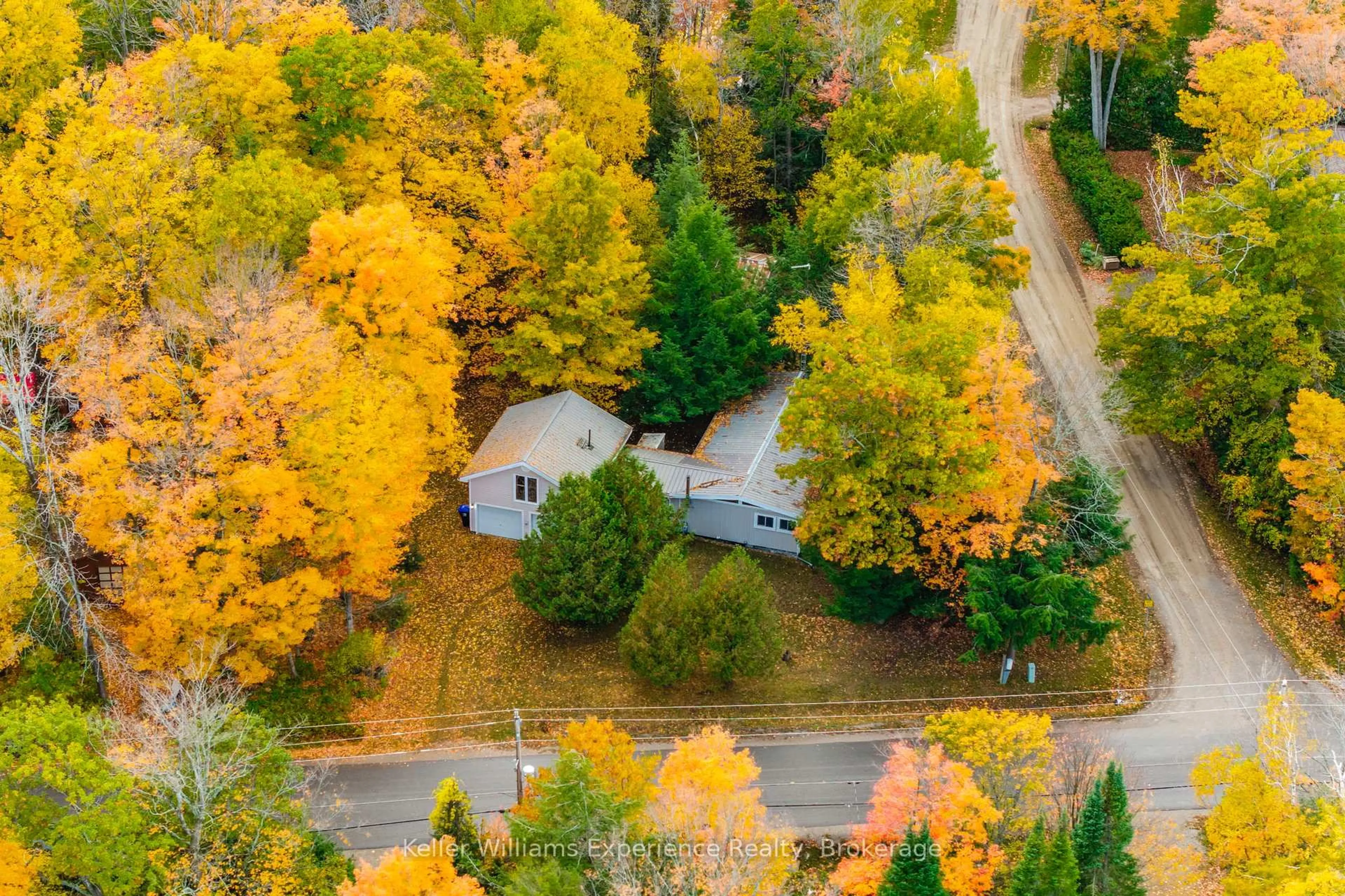 A pic from outside/outdoor area/front of a property/back of a property/a pic from drone, forest/trees view for 1 Wigwam Tr, Tiny Ontario L9M 0B1